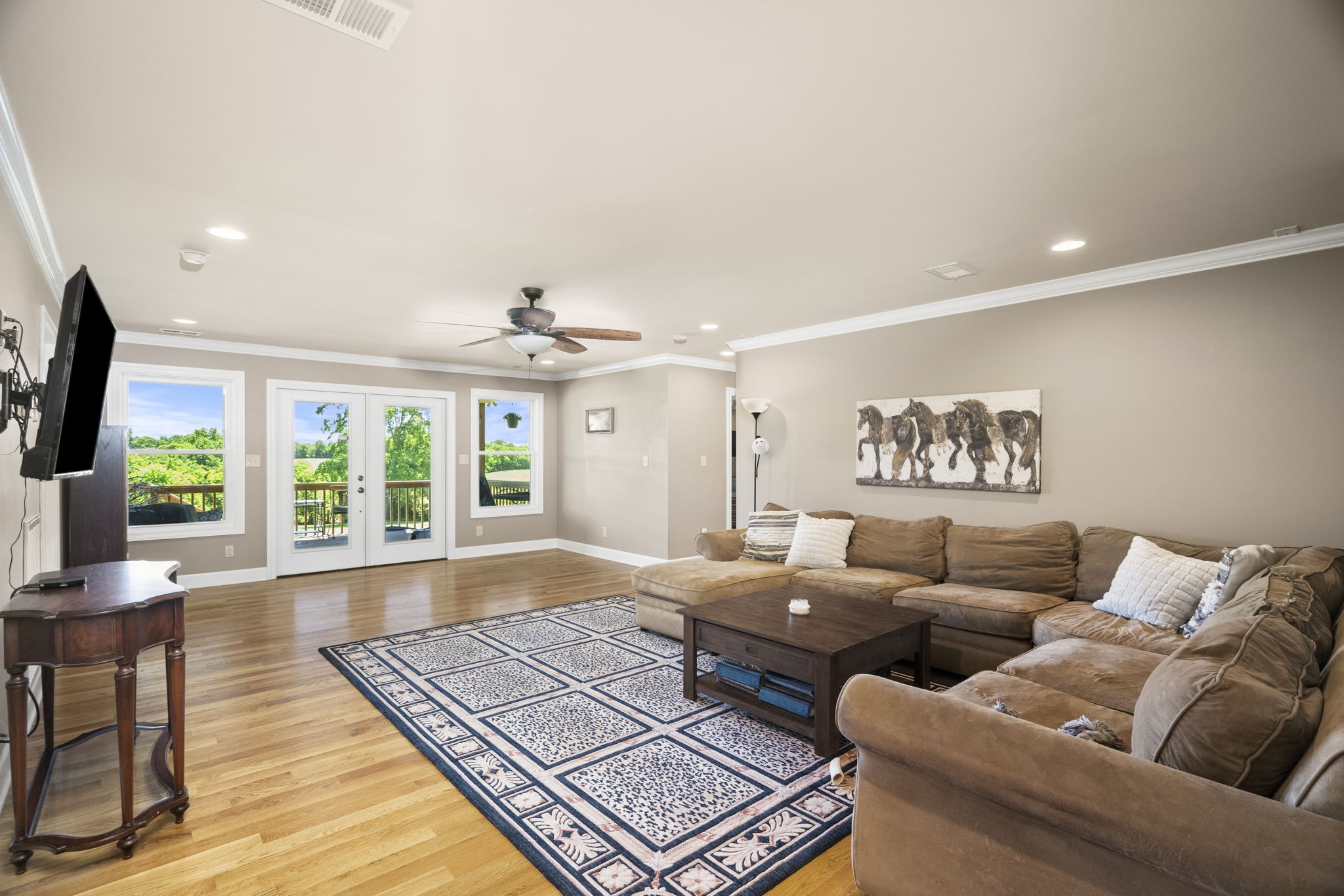 4266 Dot Road Springfield, TN 37172 - Photo 45 of 70 a living room with furniture and a floor to ceiling window