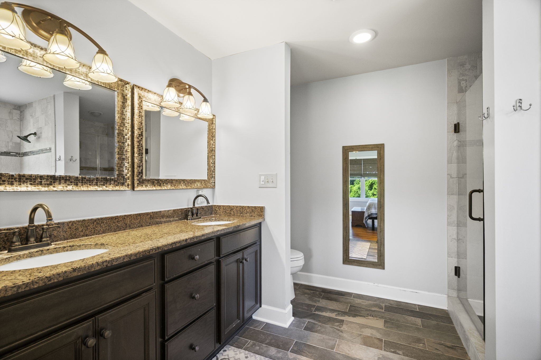 4266 Dot Road Springfield, TN 37172 - Photo 50 of 70 a bathroom with a granite countertop sink and a mirror