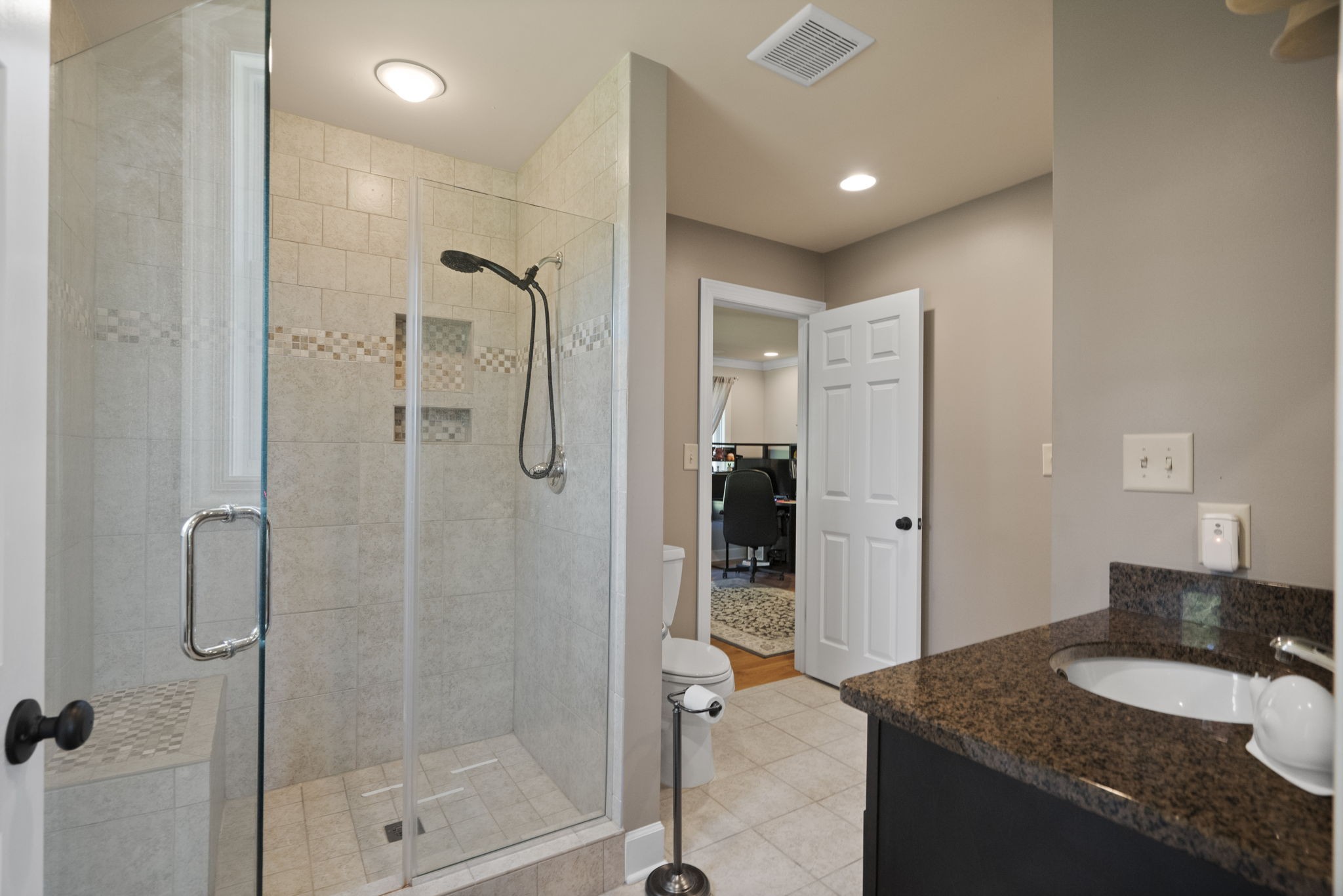 4266 Dot Road Springfield, TN 37172 - Photo 57 of 70 a bathroom with a granite countertop sink mirror and shower