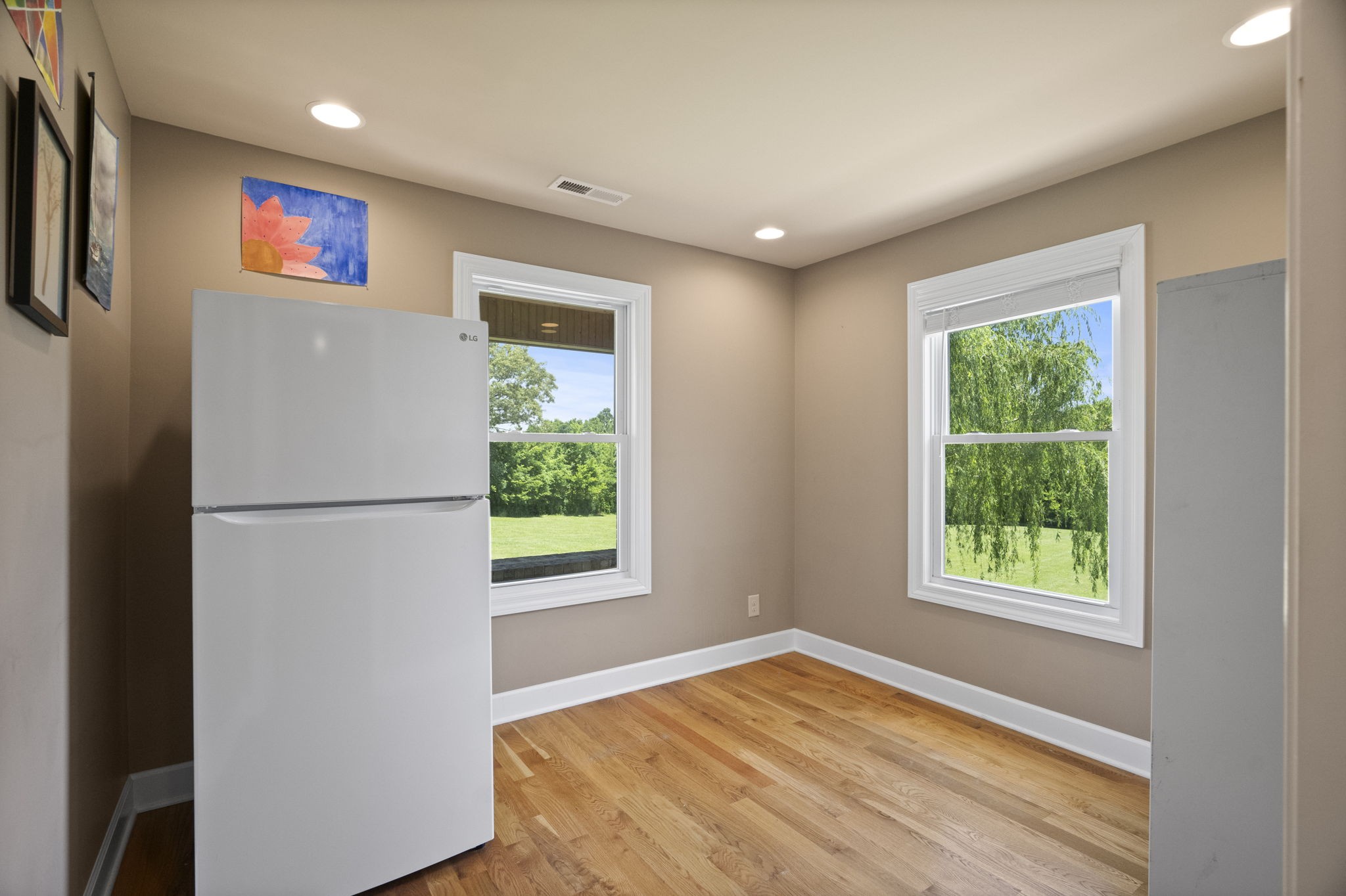 4266 Dot Road Springfield, TN 37172 - Photo 60 of 70 a view of an empty room with wooden floor and a window