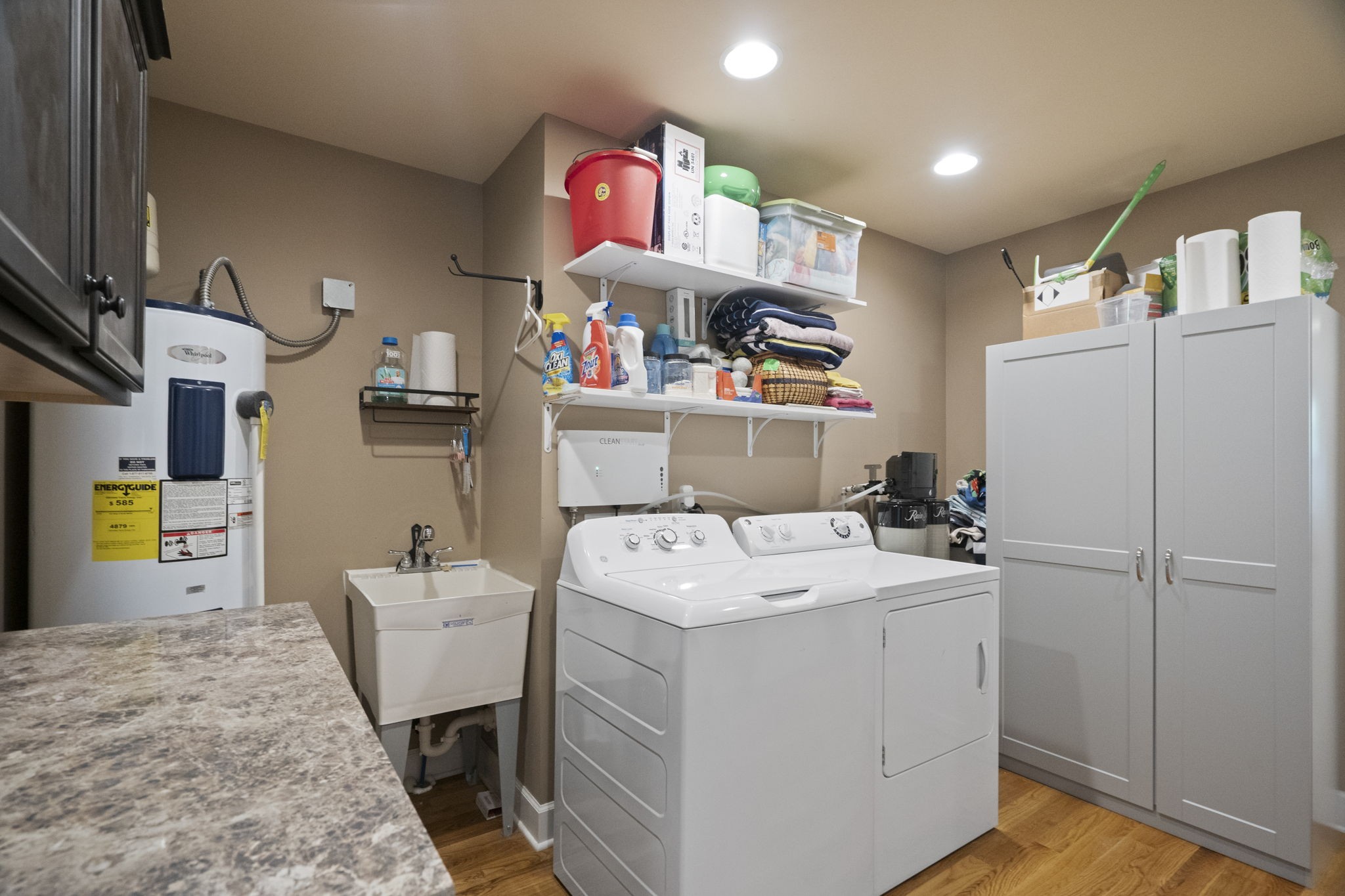 4266 Dot Road Springfield, TN 37172 - Photo 61 of 70 a utility room with cabinets washer and dryer