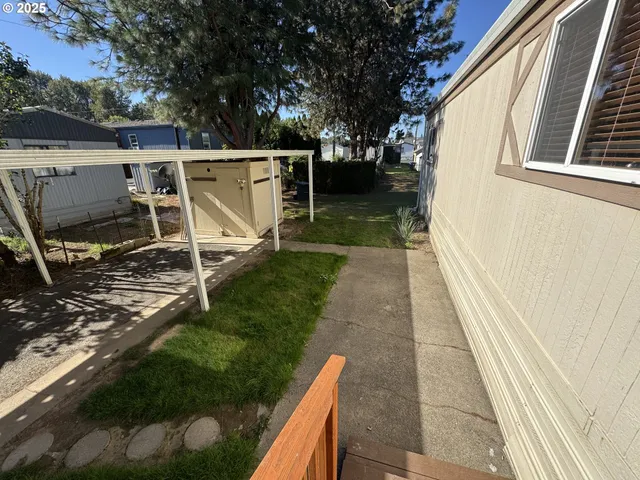 a backyard of a house with seating space