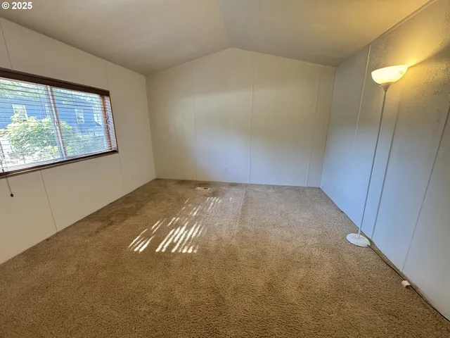 a bathroom with a tub sink and toilet