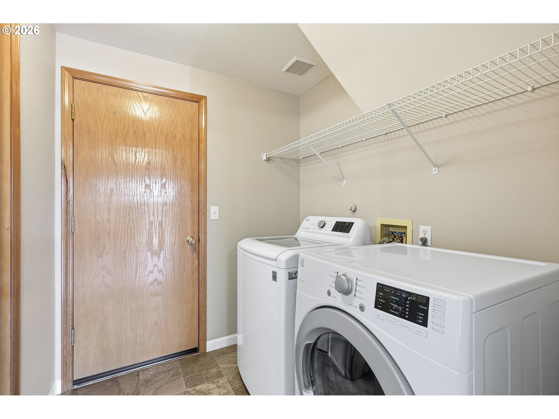 1579 Southwest 213th Avenue Beaverton, OR 97003 - Photo 22 of 48 a utility room with dryer and washer
