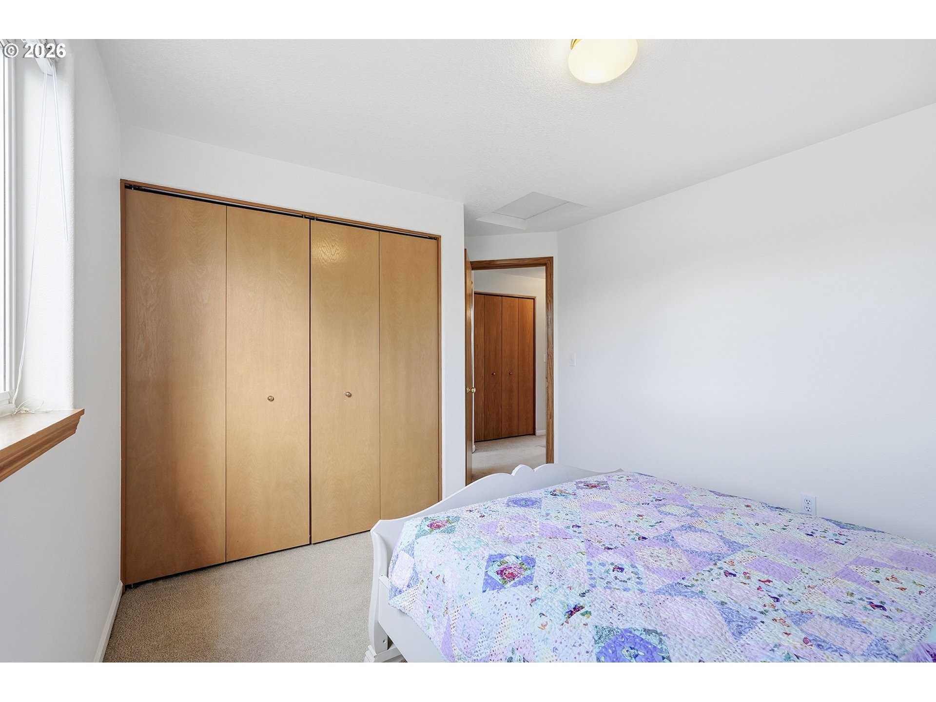 1579 Southwest 213th Avenue Beaverton, OR 97003 - Photo 29 of 48 a bedroom with a bed and a dresser