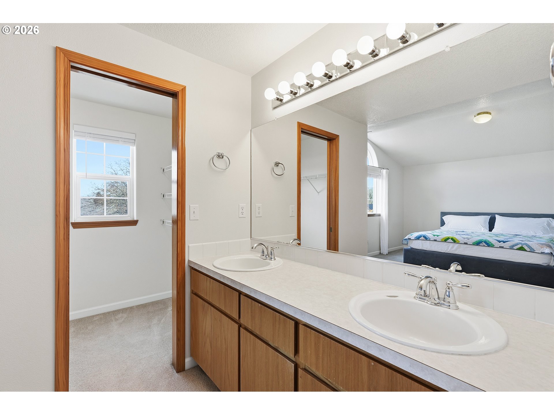 1579 Southwest 213th Avenue Beaverton, OR 97003 - Photo 38 of 48 a bathroom with a sink and a mirror