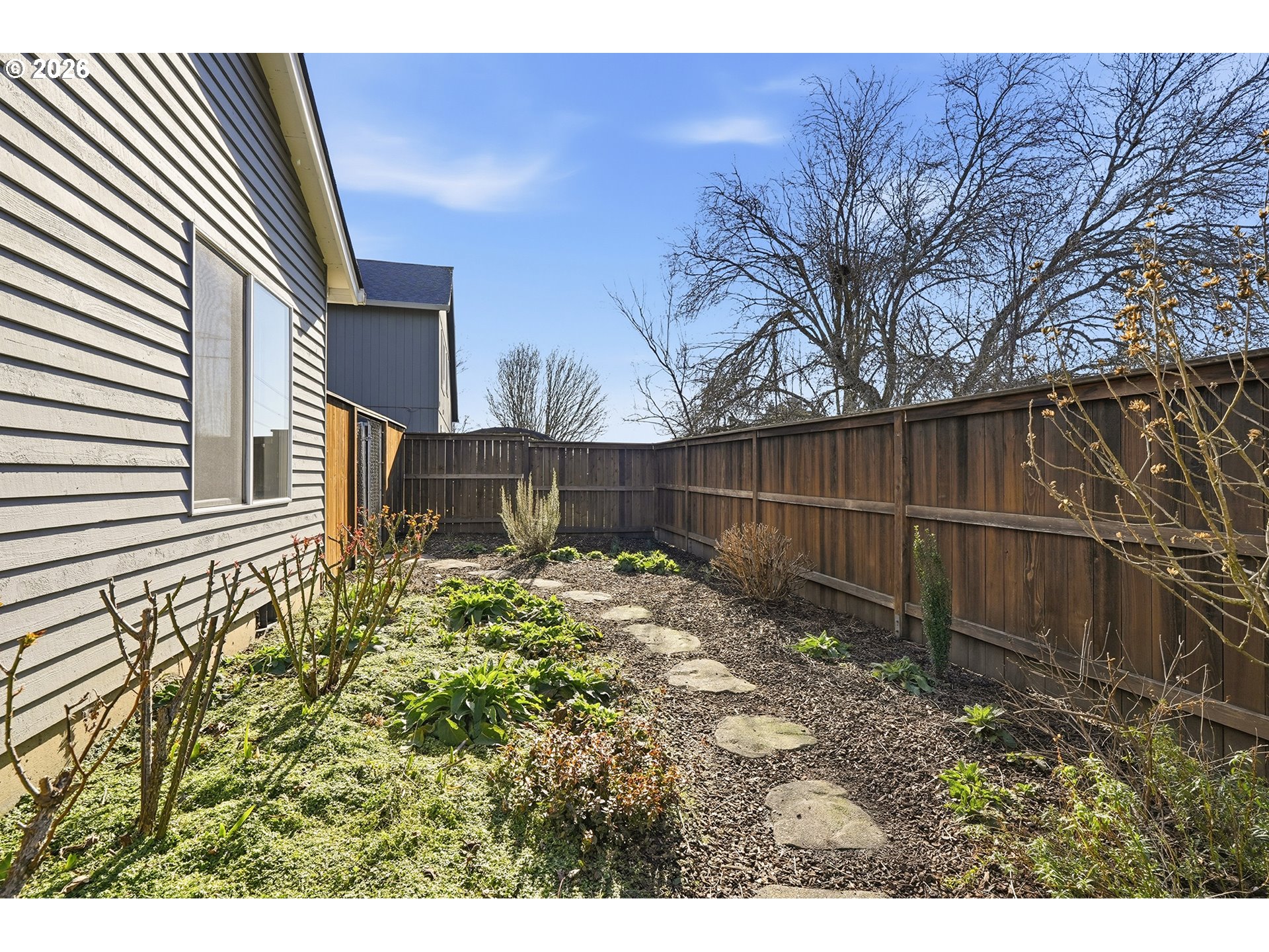 1579 Southwest 213th Avenue Beaverton, OR 97003 - Photo 45 of 48 a view of backyard with wooden fence