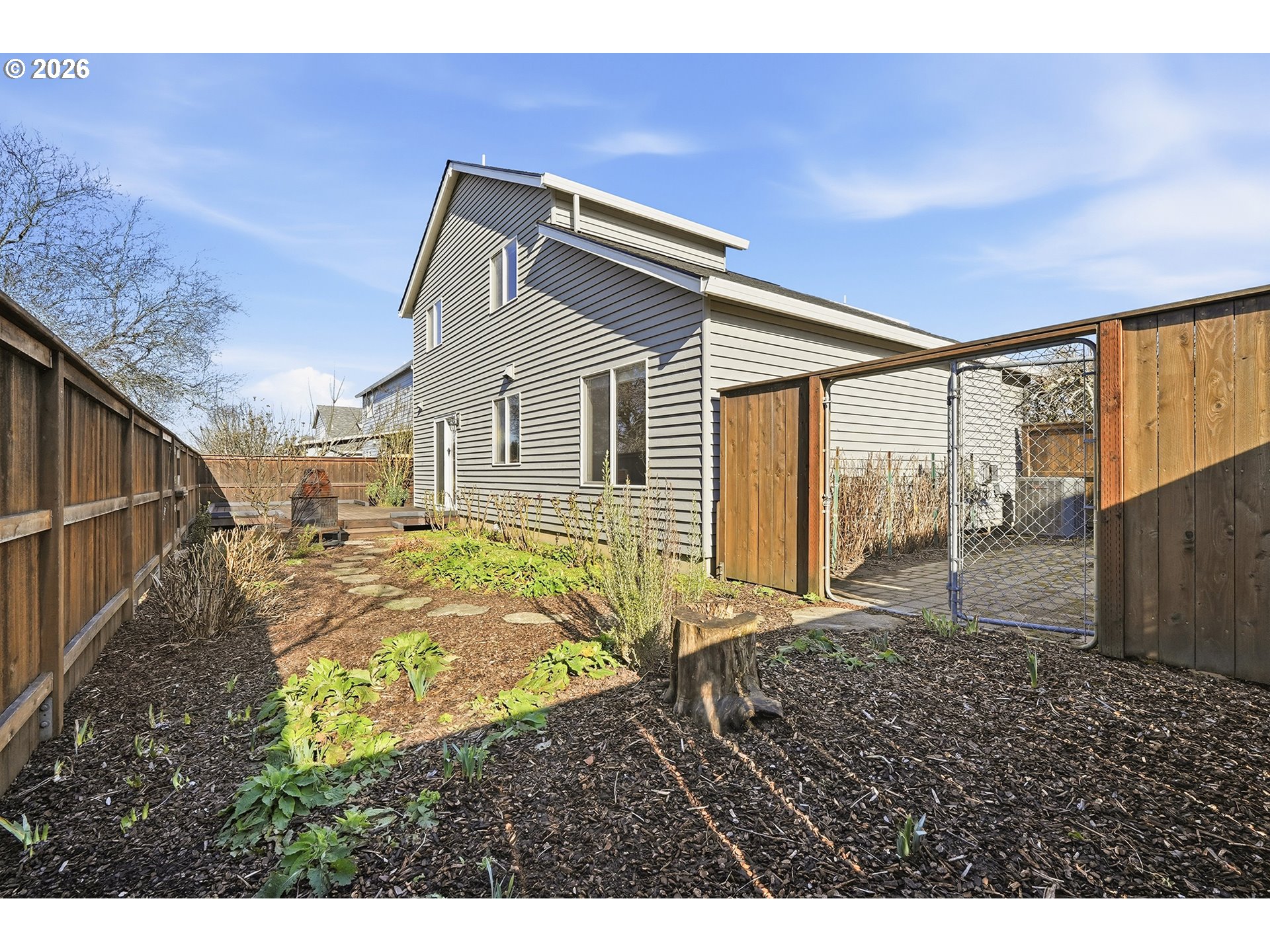 1579 Southwest 213th Avenue Beaverton, OR 97003 - Photo 46 of 48 a view of a house with a yard
