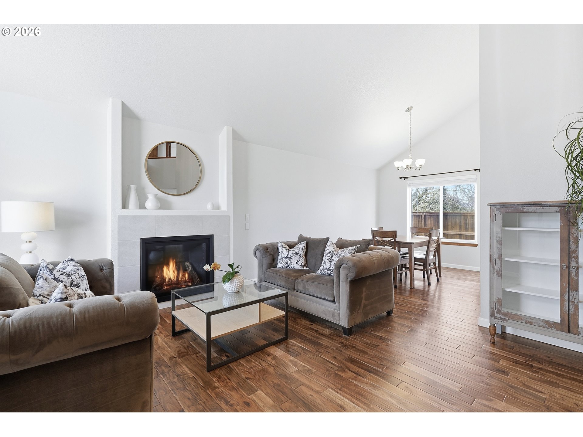 1579 Southwest 213th Avenue Beaverton, OR 97003 - Photo 5 of 48 a living room with furniture and a fireplace
