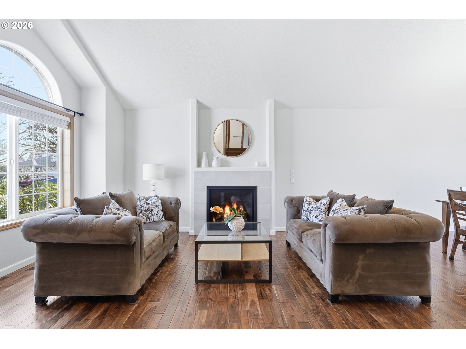 1579 Southwest 213th Avenue Beaverton, OR 97003 - Photo 6 of 48 a living room with furniture and a fireplace
