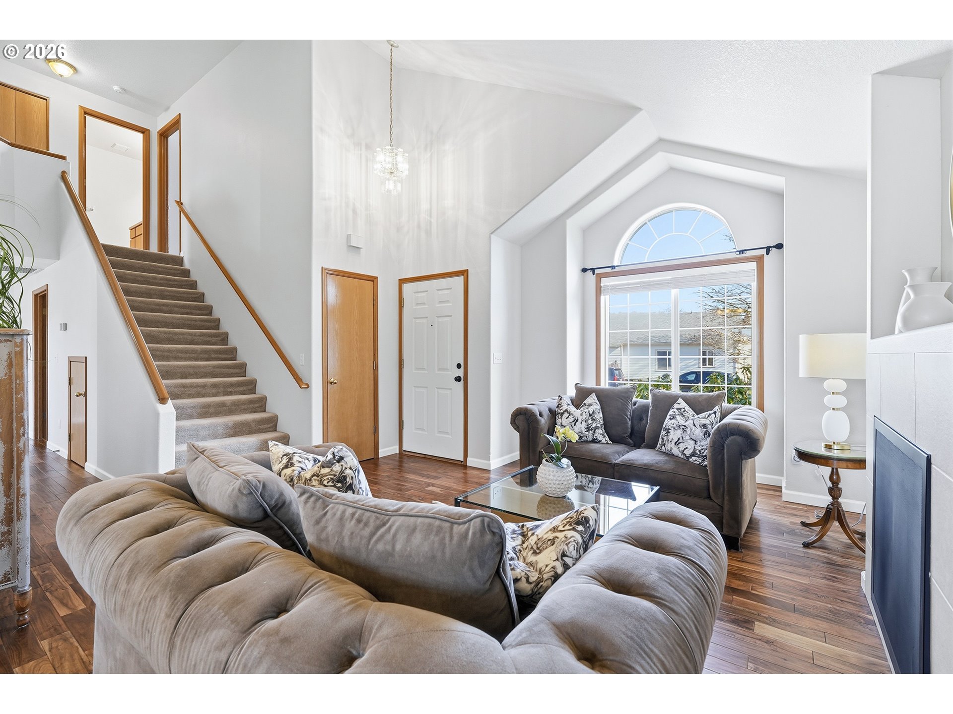 1579 Southwest 213th Avenue Beaverton, OR 97003 - Photo 8 of 48 a living room with furniture and a large window