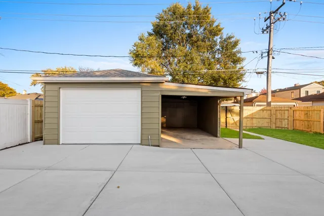 a view of front door of house with yard