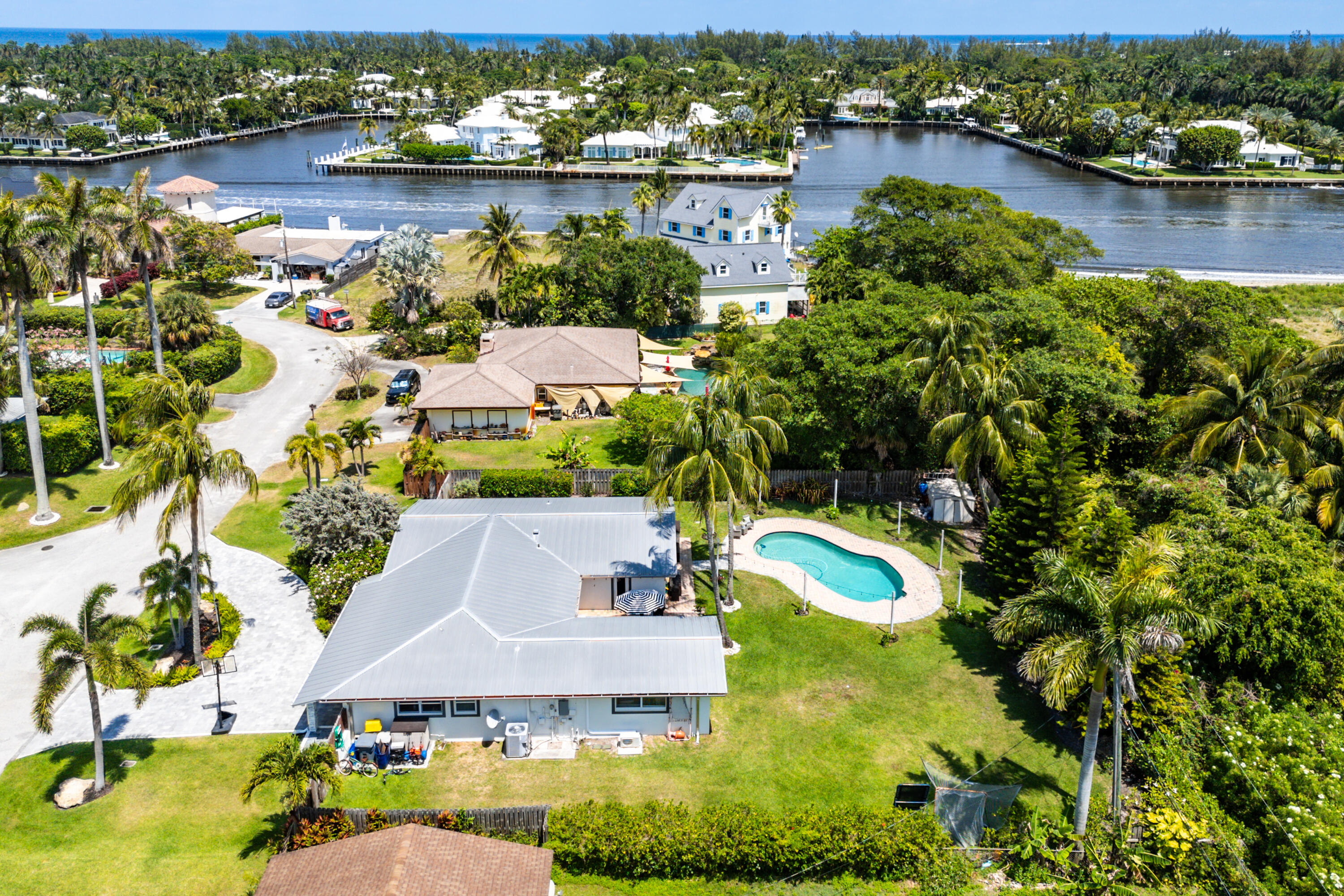 an aerial view of a house with a lake view