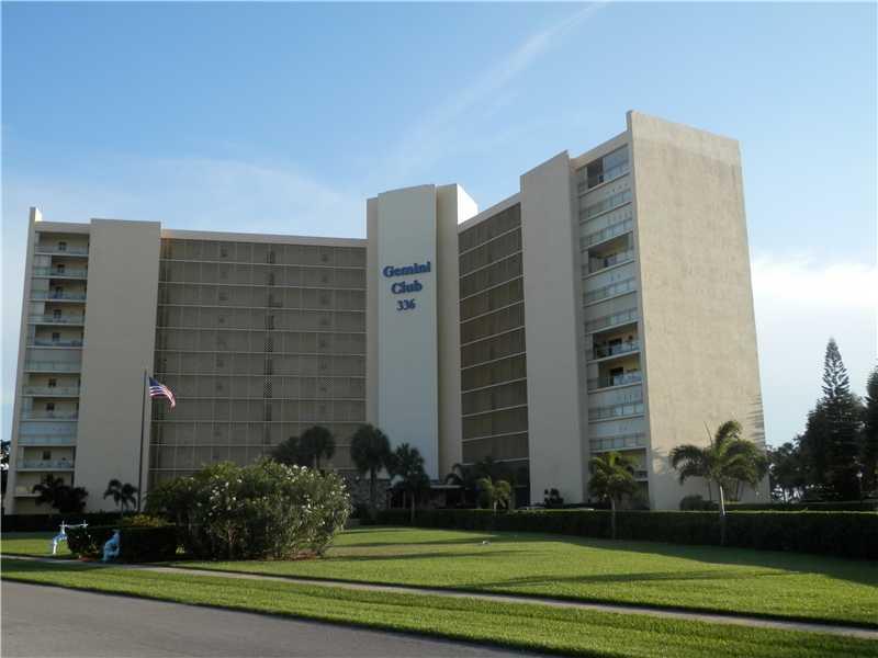 336 Golfview Road, Unit PH5 North Palm Beach, FL 33408 - Photo 1 of 11 a view of a building with a yard