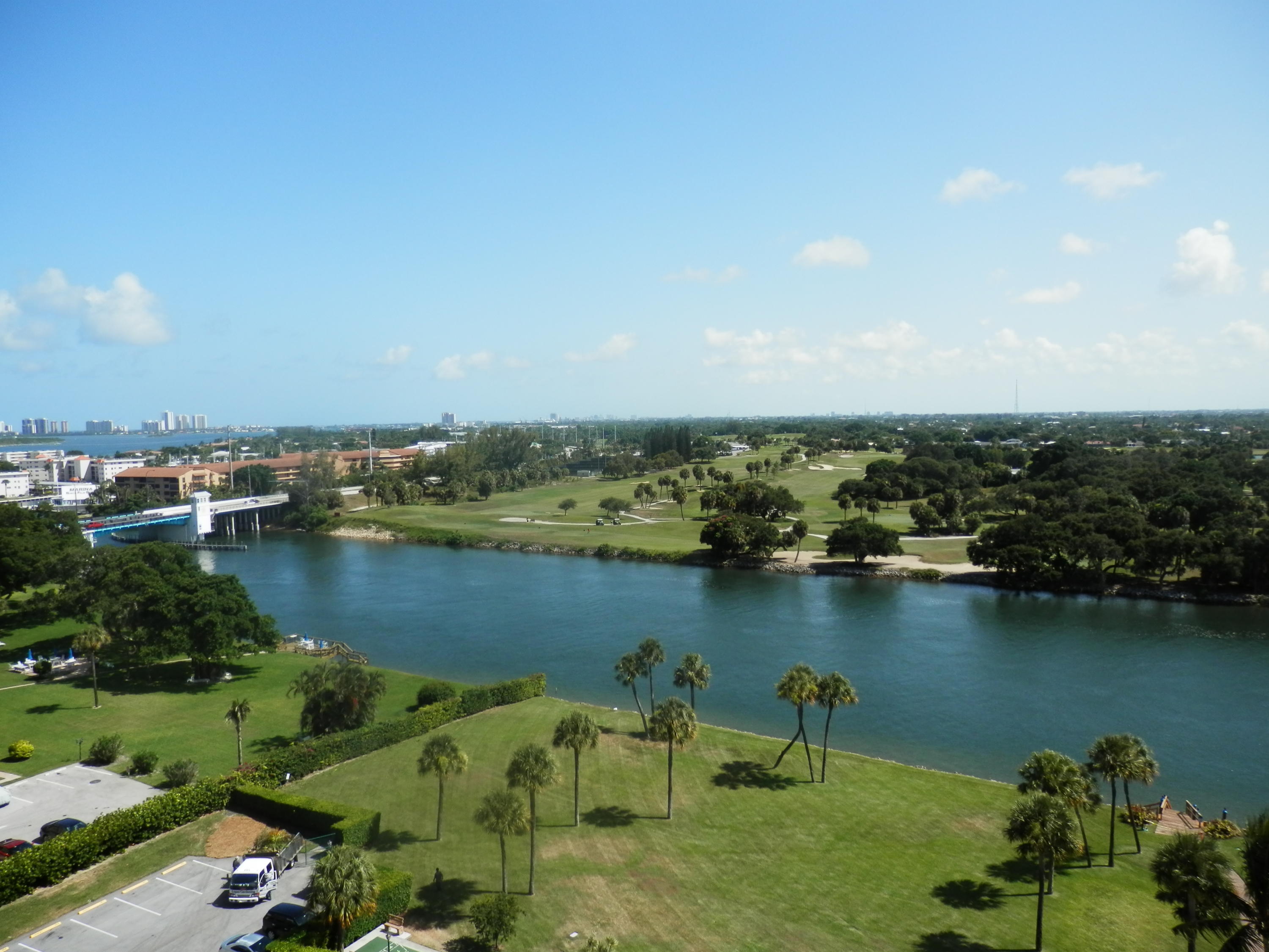 336 Golfview Road, Unit PH5 North Palm Beach, FL 33408 - Photo 2 of 11 an aerial view of a houses with a lake view