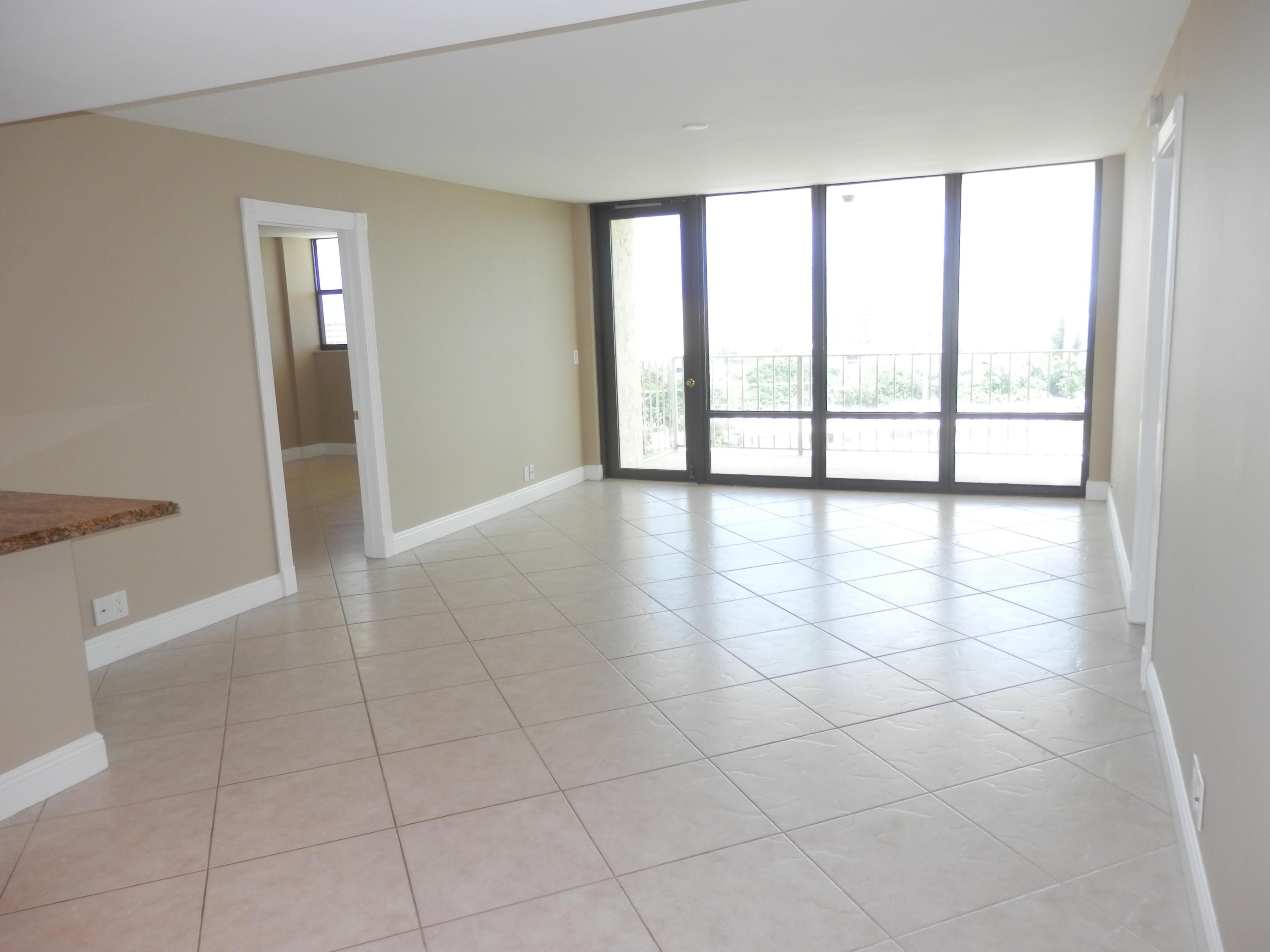 336 Golfview Road, Unit PH5 North Palm Beach, FL 33408 - Photo 5 of 11 a view of an empty room with a window