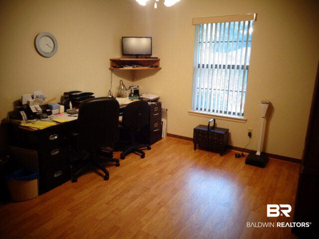 2804 Pine Ridge Drive Lillian, AL 36549 - Photo 22 of 39 12 x 11. Laminate wood look floor. Ceiling fan/light. Marble window sill.