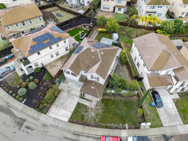 an aerial view of a city with ocean view