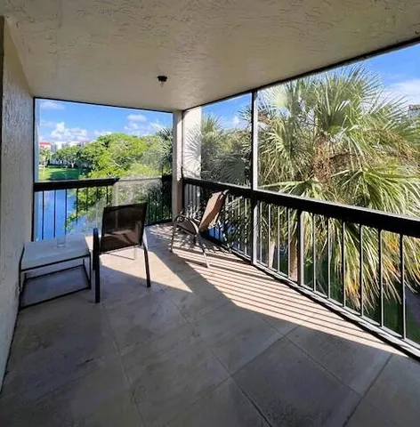 a view of two chairs in the roof deck