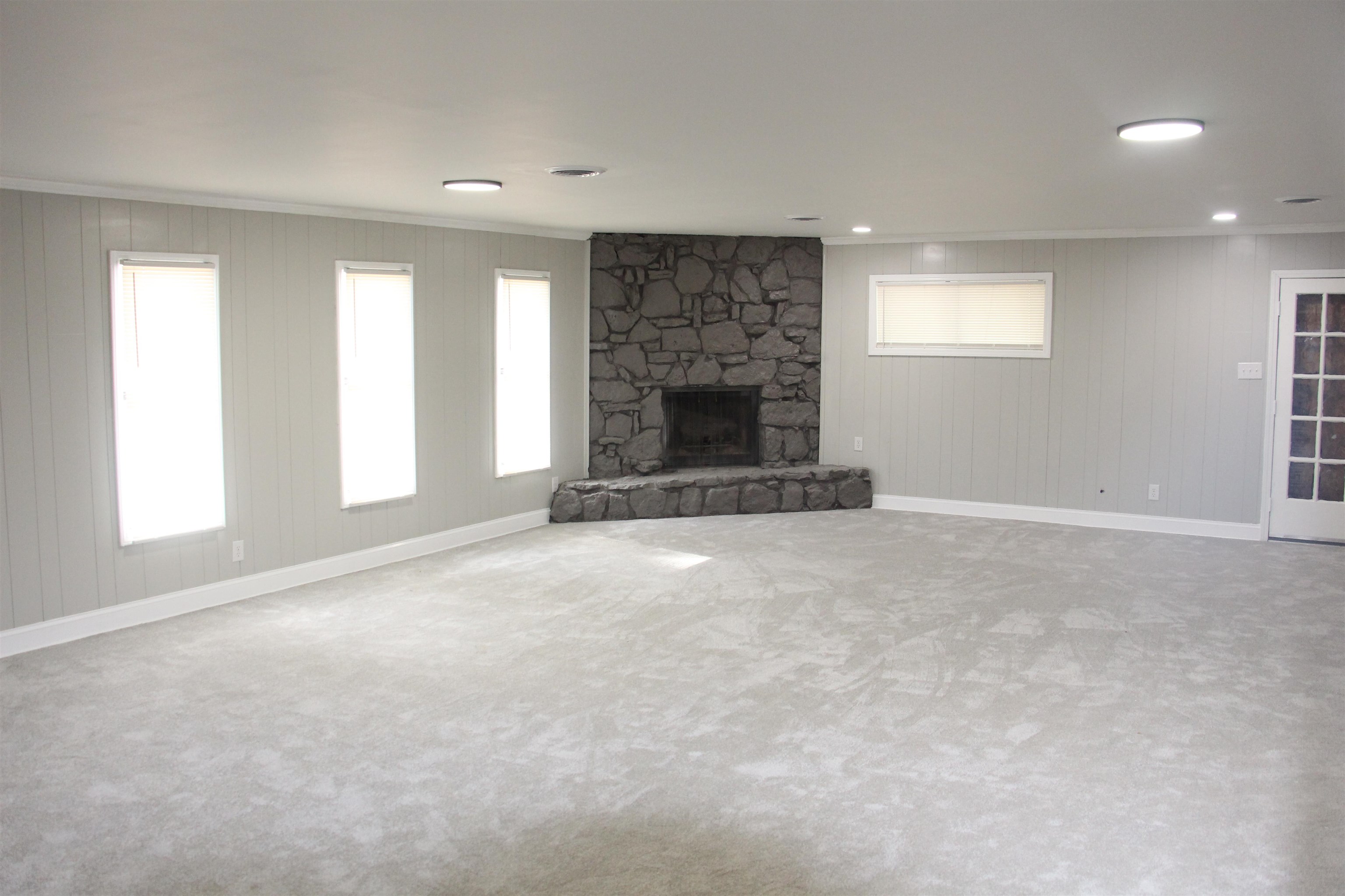 545 Dreger Road Memphis, TN 38109 - Photo 4 of 26 a view of a livingroom with a fireplace and window