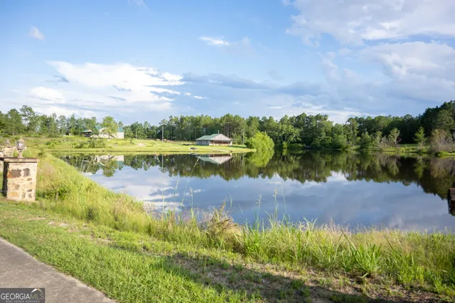a living room with furniture flat screen tv and fireplace