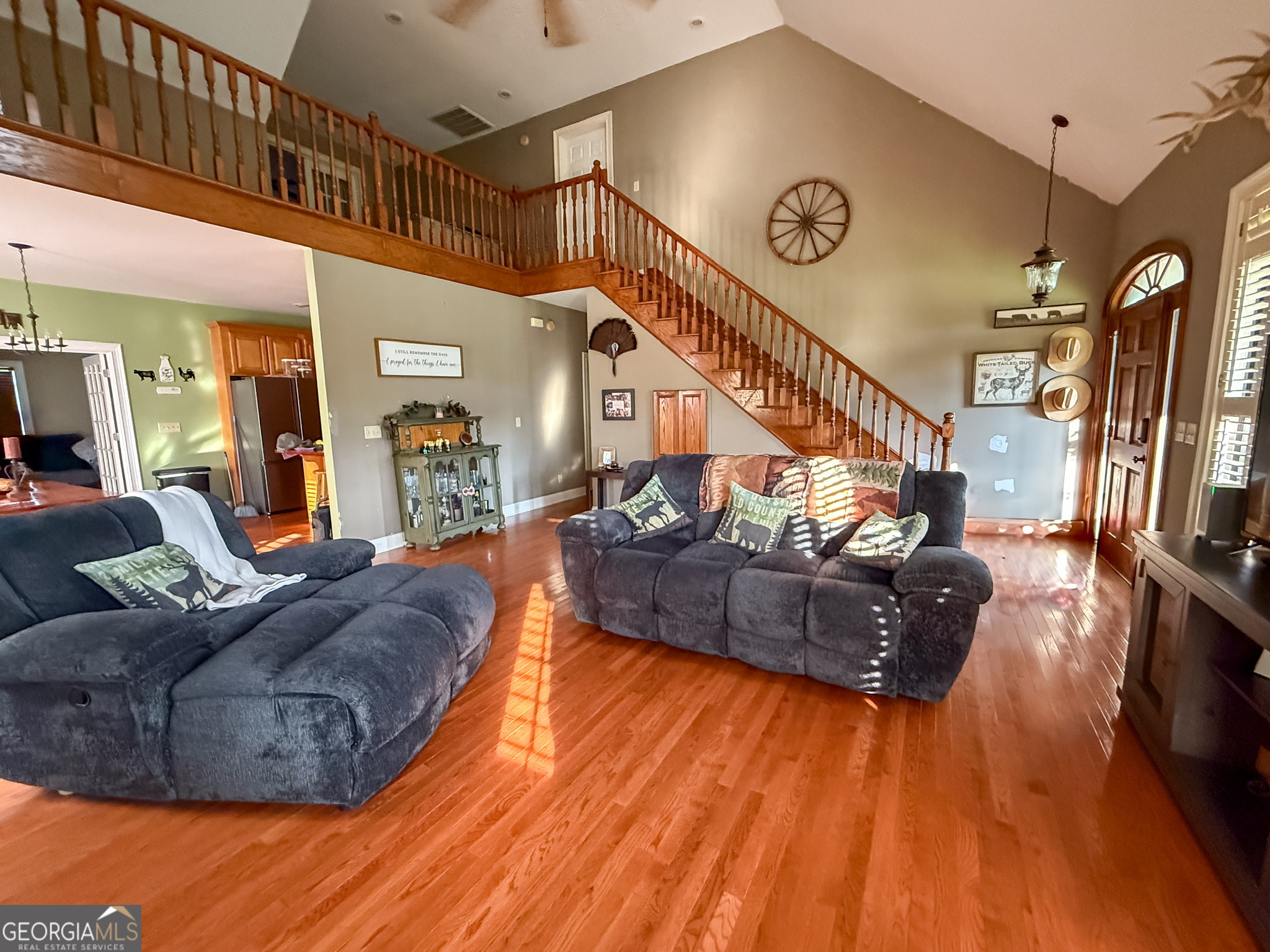1940 Horne Road Eastman, GA 31023 - Photo 25 of 94 a living room with furniture and a wooden floor