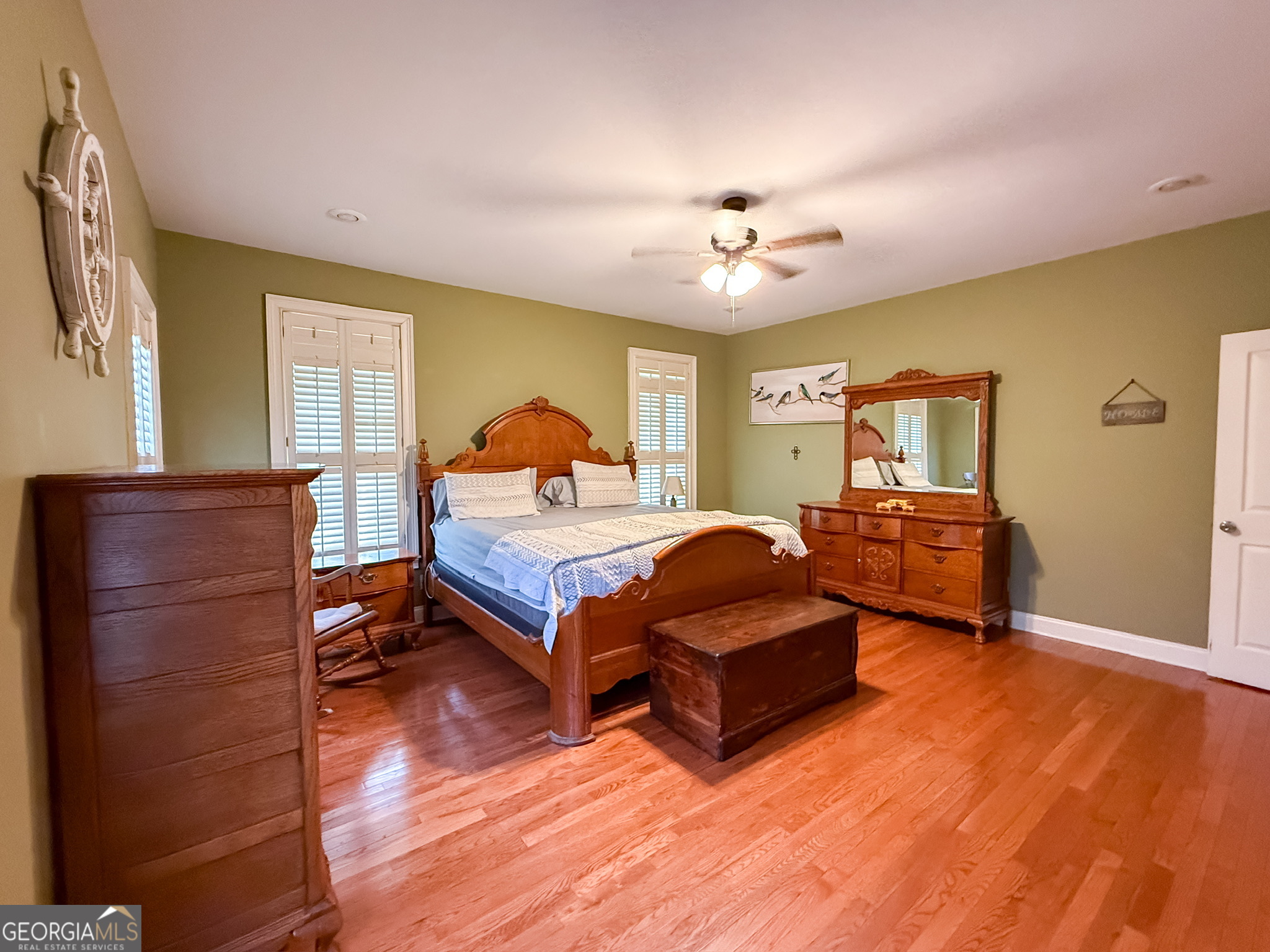 1940 Horne Road Eastman, GA 31023 - Photo 39 of 94 a bedroom with a bed and wooden floor