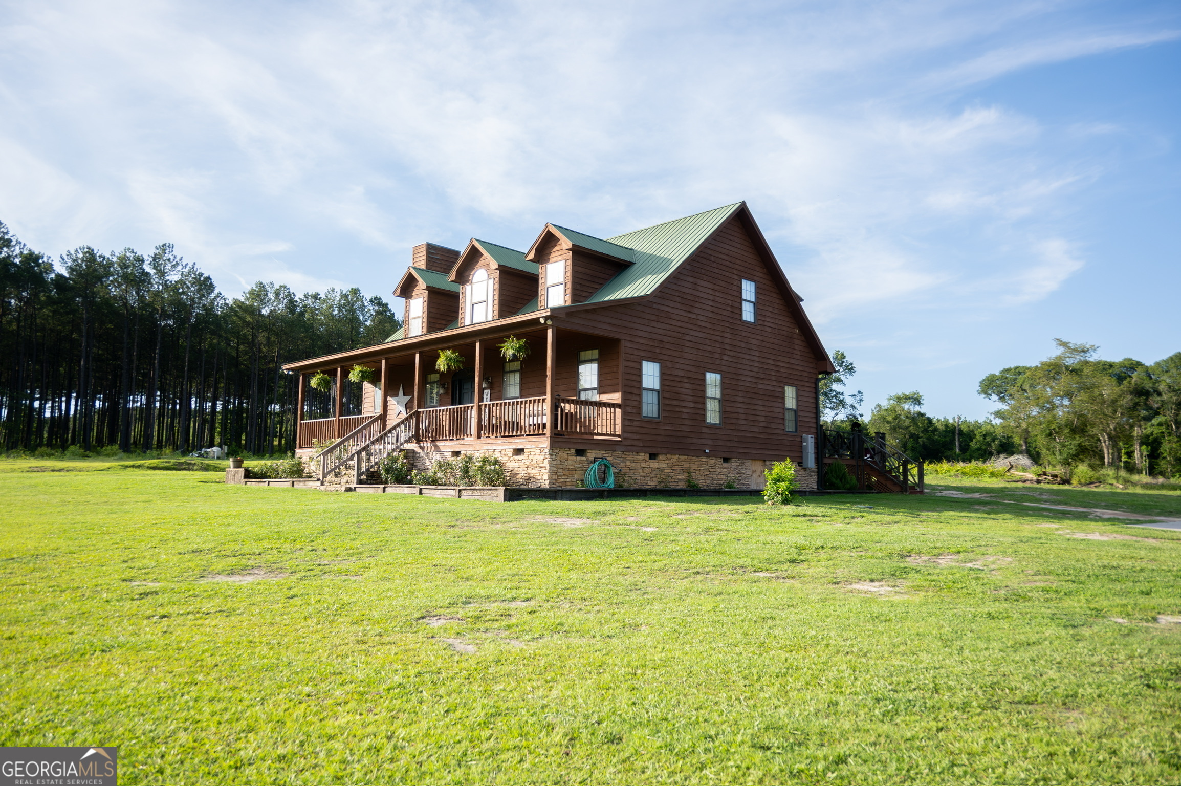 1940 Horne Road Eastman, GA 31023 - Photo 4 of 94 a front view of house with yard and green space