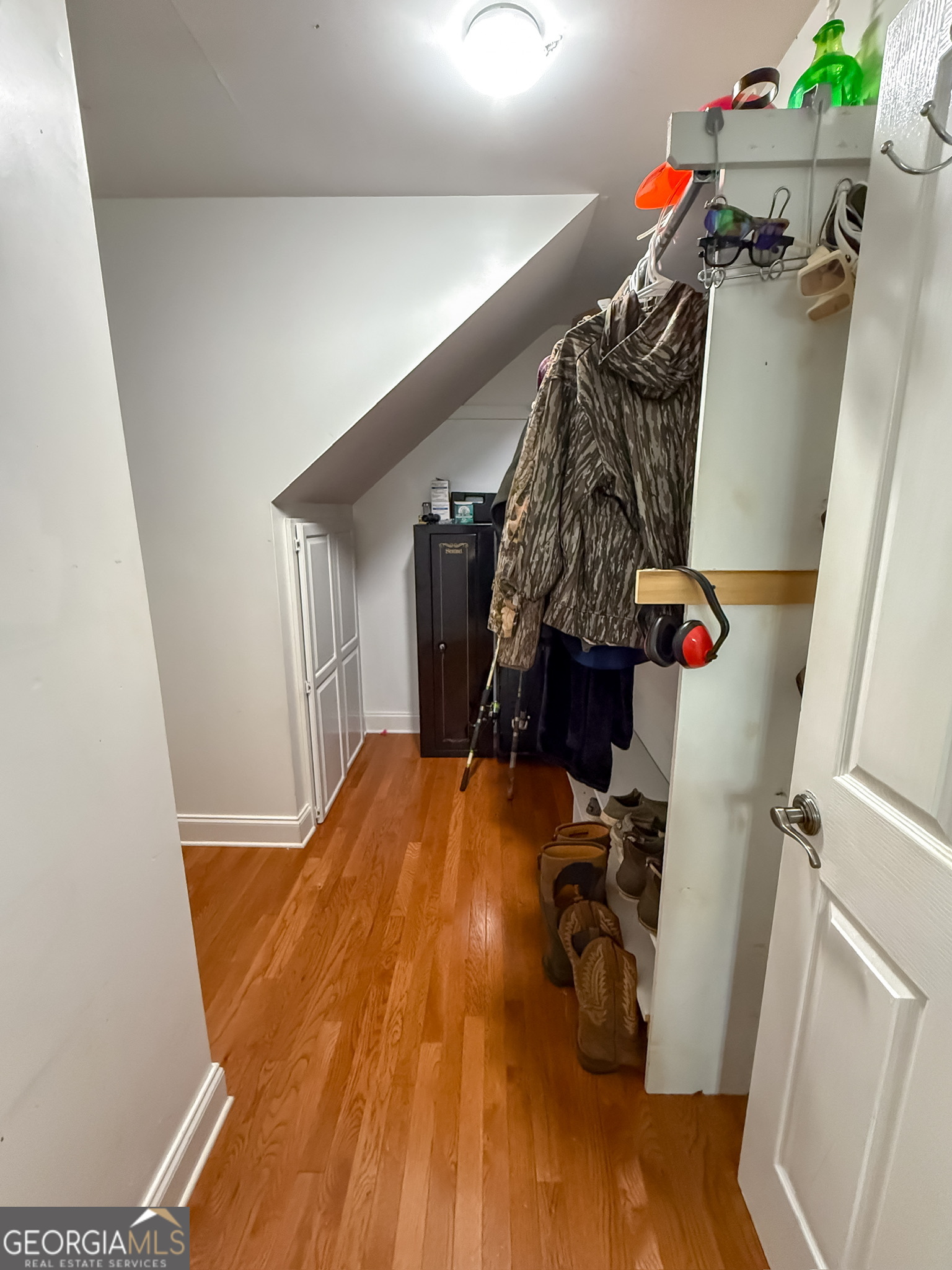 1940 Horne Road Eastman, GA 31023 - Photo 52 of 94 a view of walk in closet with clothes and shoes