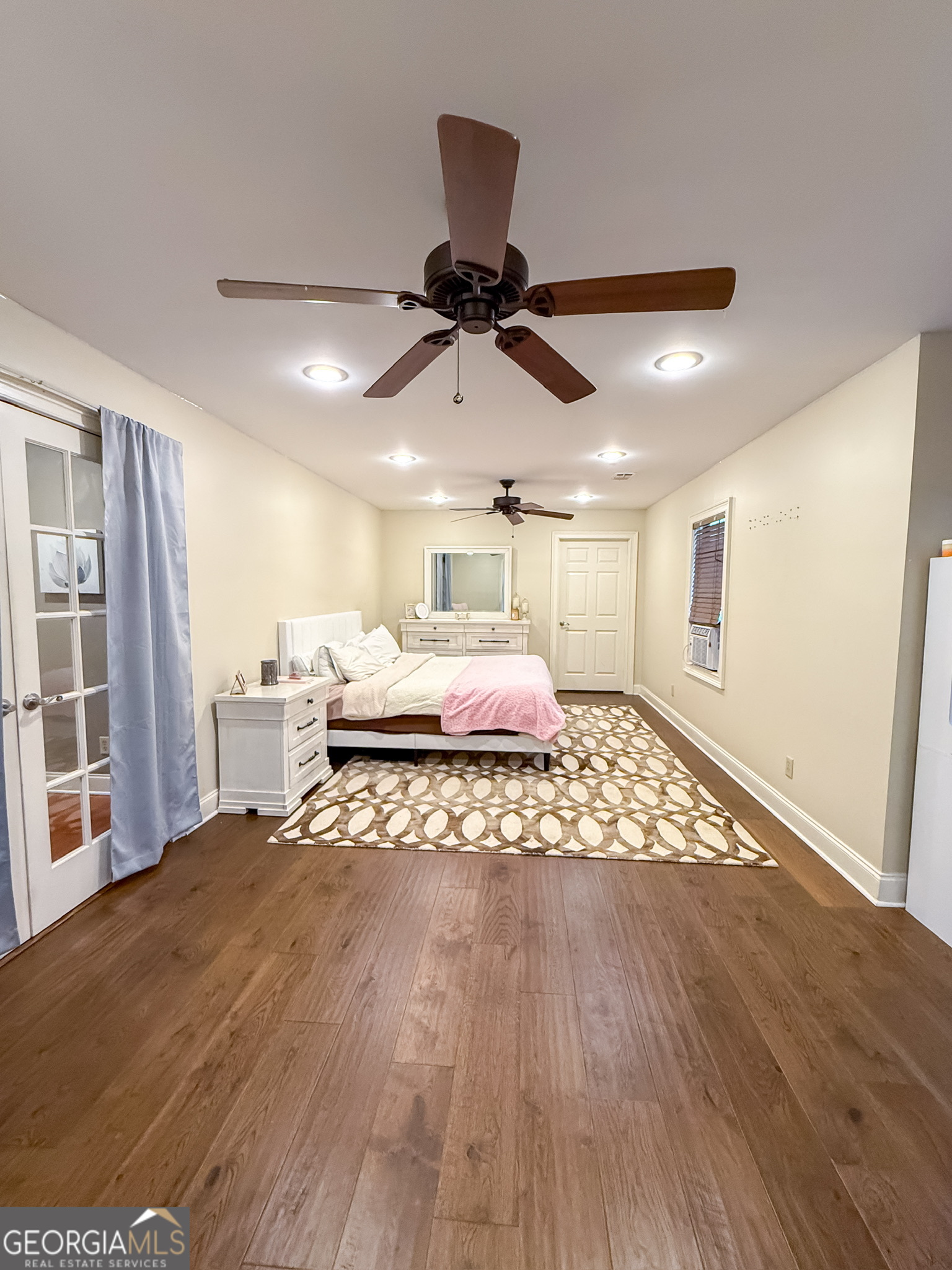 1940 Horne Road Eastman, GA 31023 - Photo 58 of 94 a bedroom with a bed and a ceiling fan