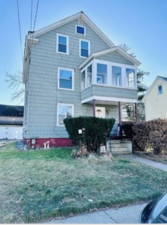 12 Princeton Avenue, Unit 2 Easthampton, MA 01027 - Photo 2 of 20 a front view of house with yard and outdoor seating