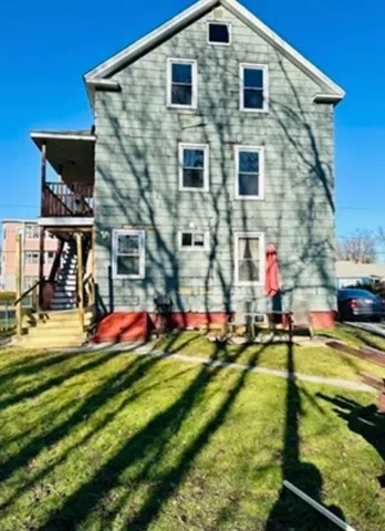 a front view of a house with swimming pool