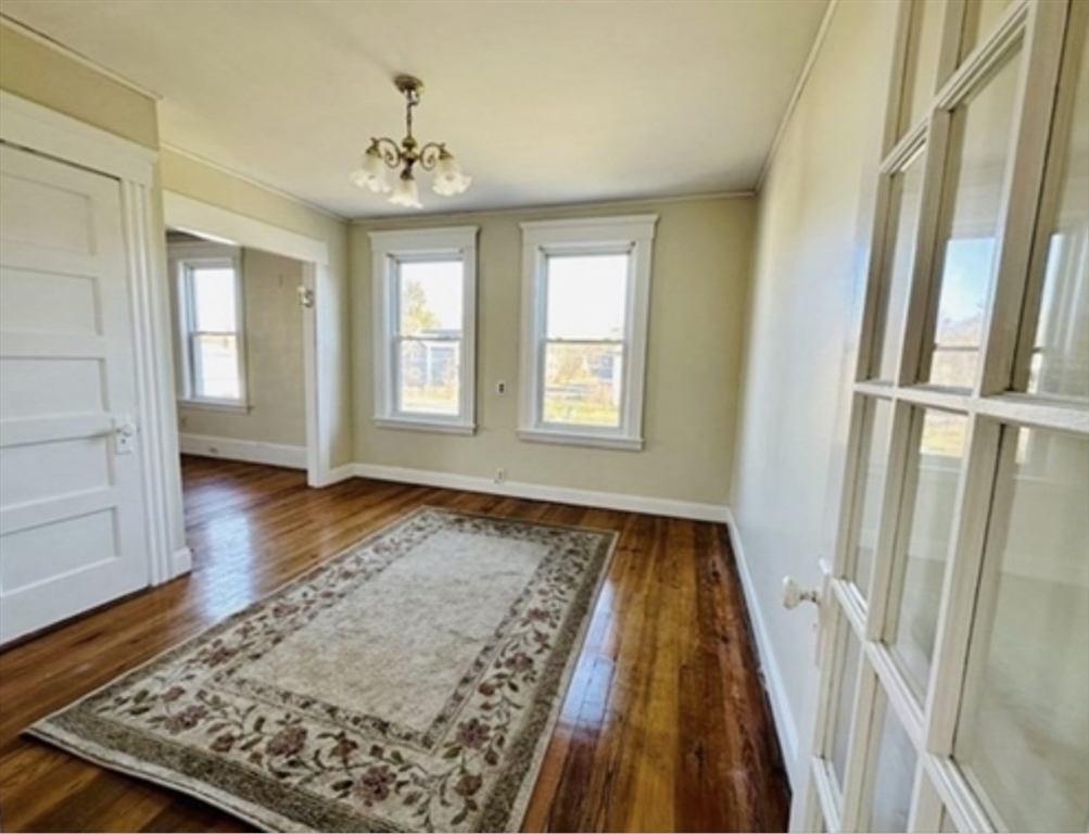 12 Princeton Avenue, Unit 2 Easthampton, MA 01027 - Photo 5 of 20 wooden floor in an empty room with a rug