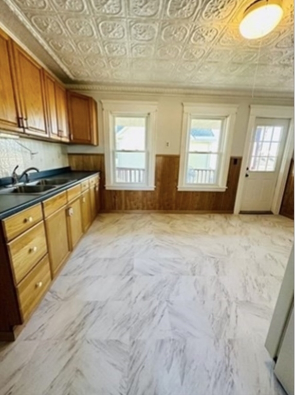 12 Princeton Avenue, Unit 2 Easthampton, MA 01027 - Photo 7 of 20 a view of a kitchen with granite countertop cabinets stainless steel appliances a window and a sink