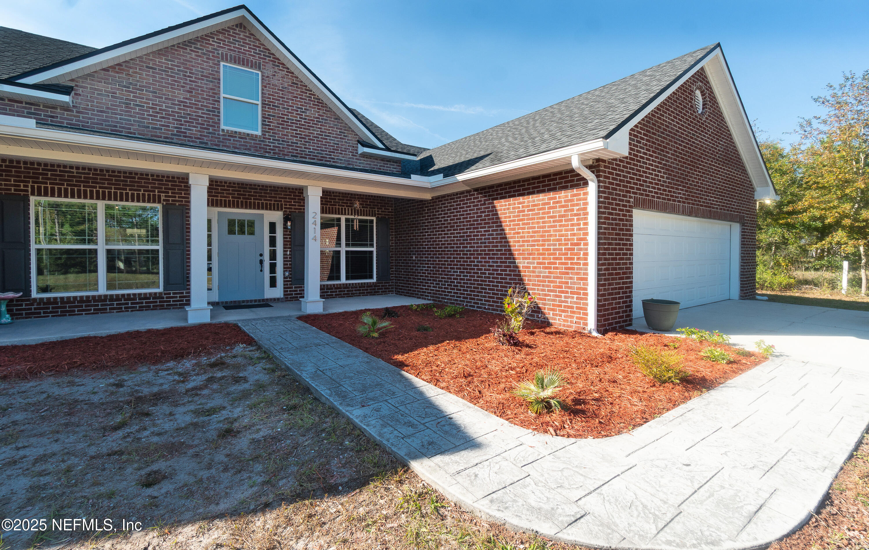 2414 Range Line Road Middleburg, FL 32068 - Photo 2 of 39 a view of a house with entertaining space