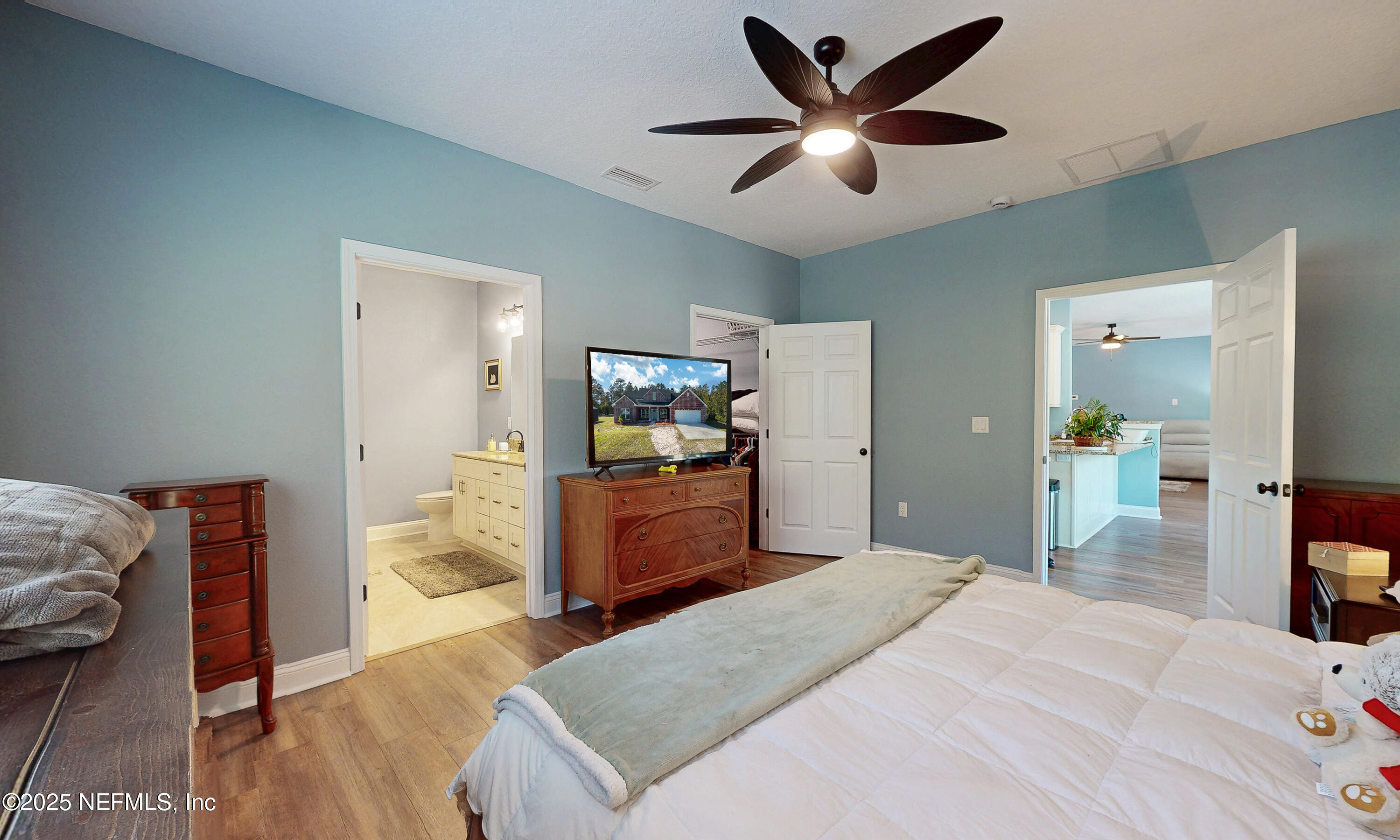 2414 Range Line Road Middleburg, FL 32068 - Photo 21 of 39 a bedroom with a bed and a dresser