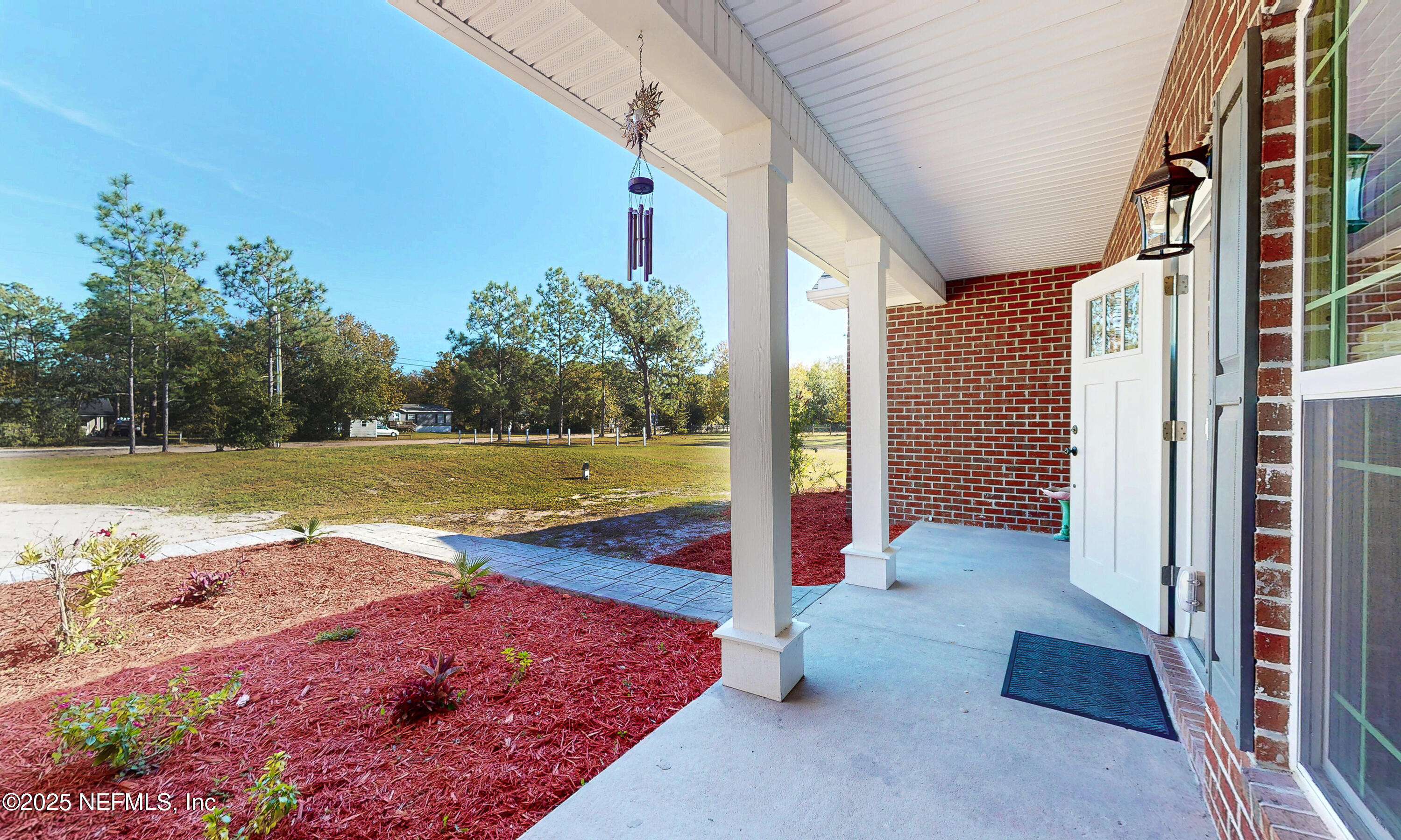 2414 Range Line Road Middleburg, FL 32068 - Photo 3 of 39 a view of a swimming pool with a yard