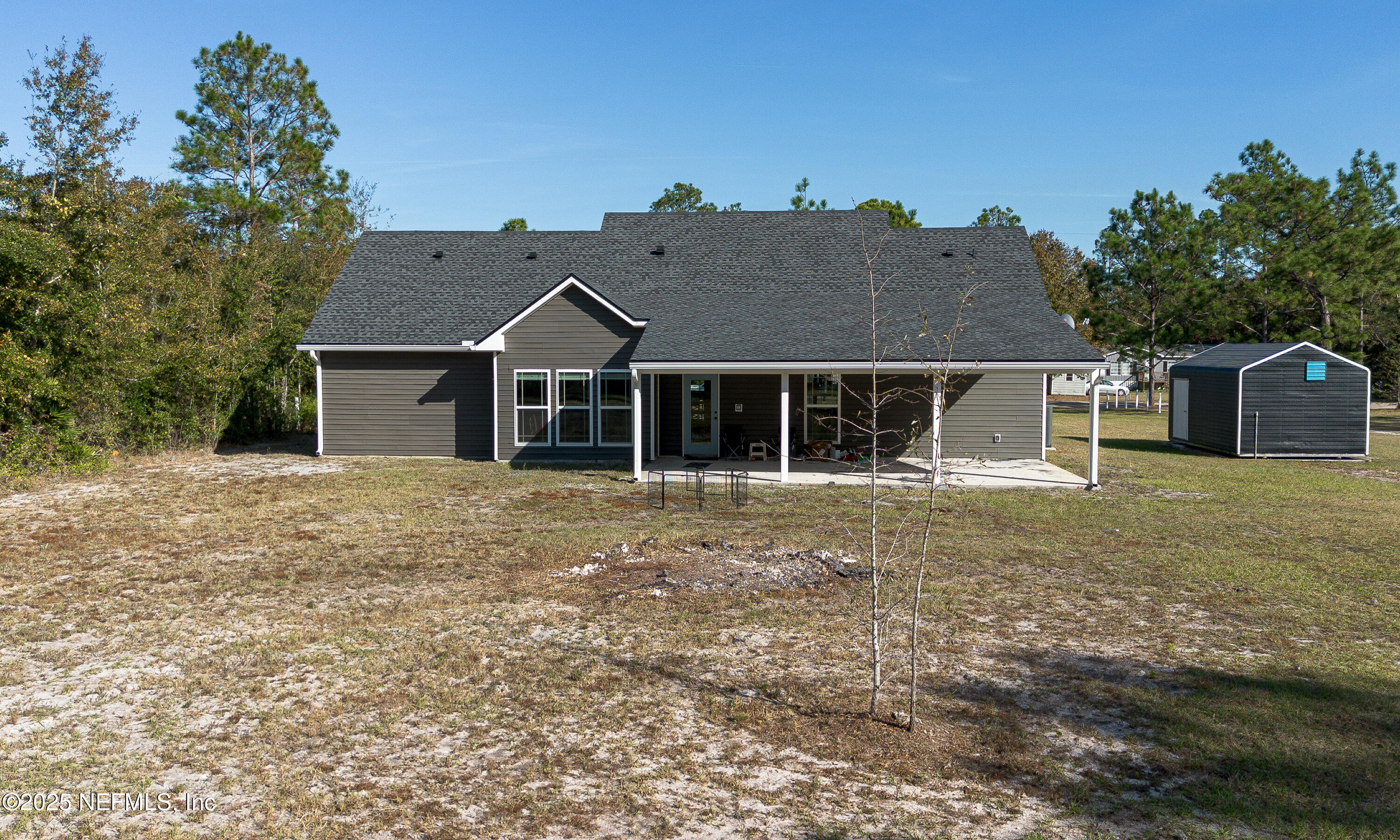 2414 Range Line Road Middleburg, FL 32068 - Photo 31 of 39 front view of a house with a yard