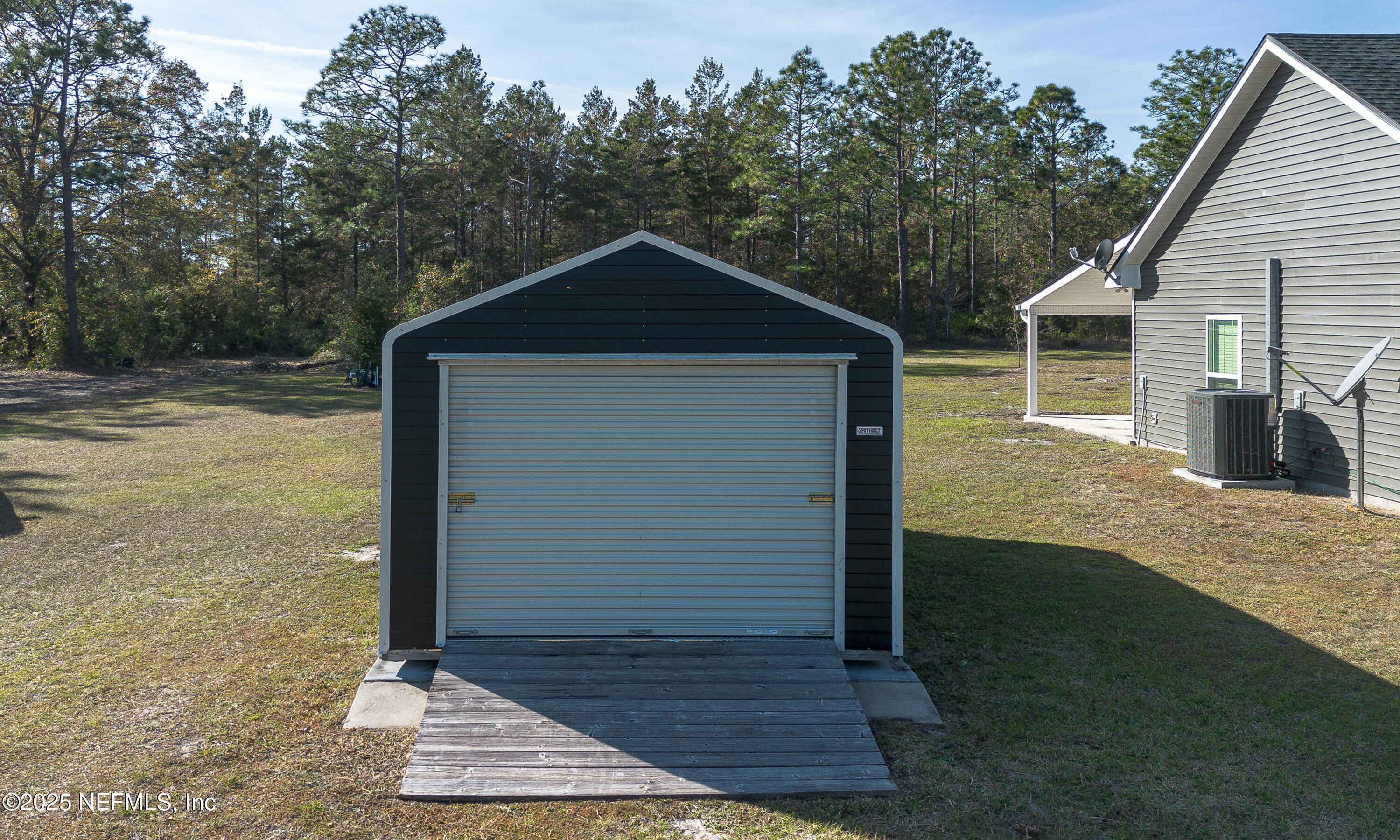 2414 Range Line Road Middleburg, FL 32068 - Photo 36 of 39 a front view of a house with a yard