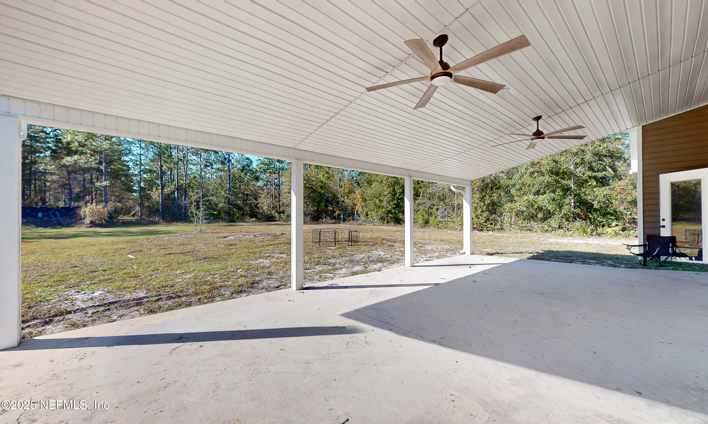 2414 Range Line Road Middleburg, FL 32068 - Photo 5 of 39 a view of a house with backyard and porch