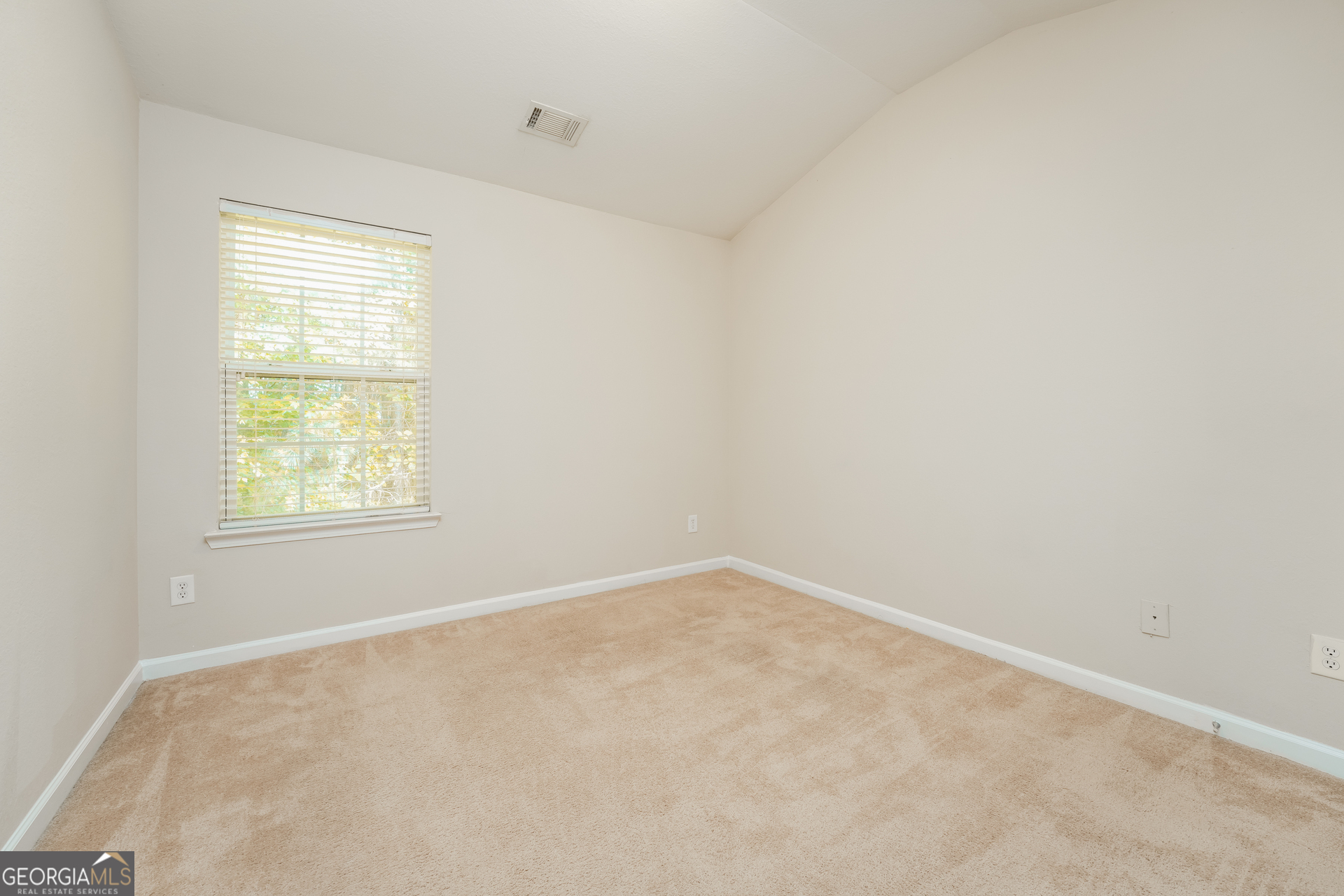 1259 Chinon Point Lithonia, GA 30058 - Photo 11 of 15 an empty room with a window