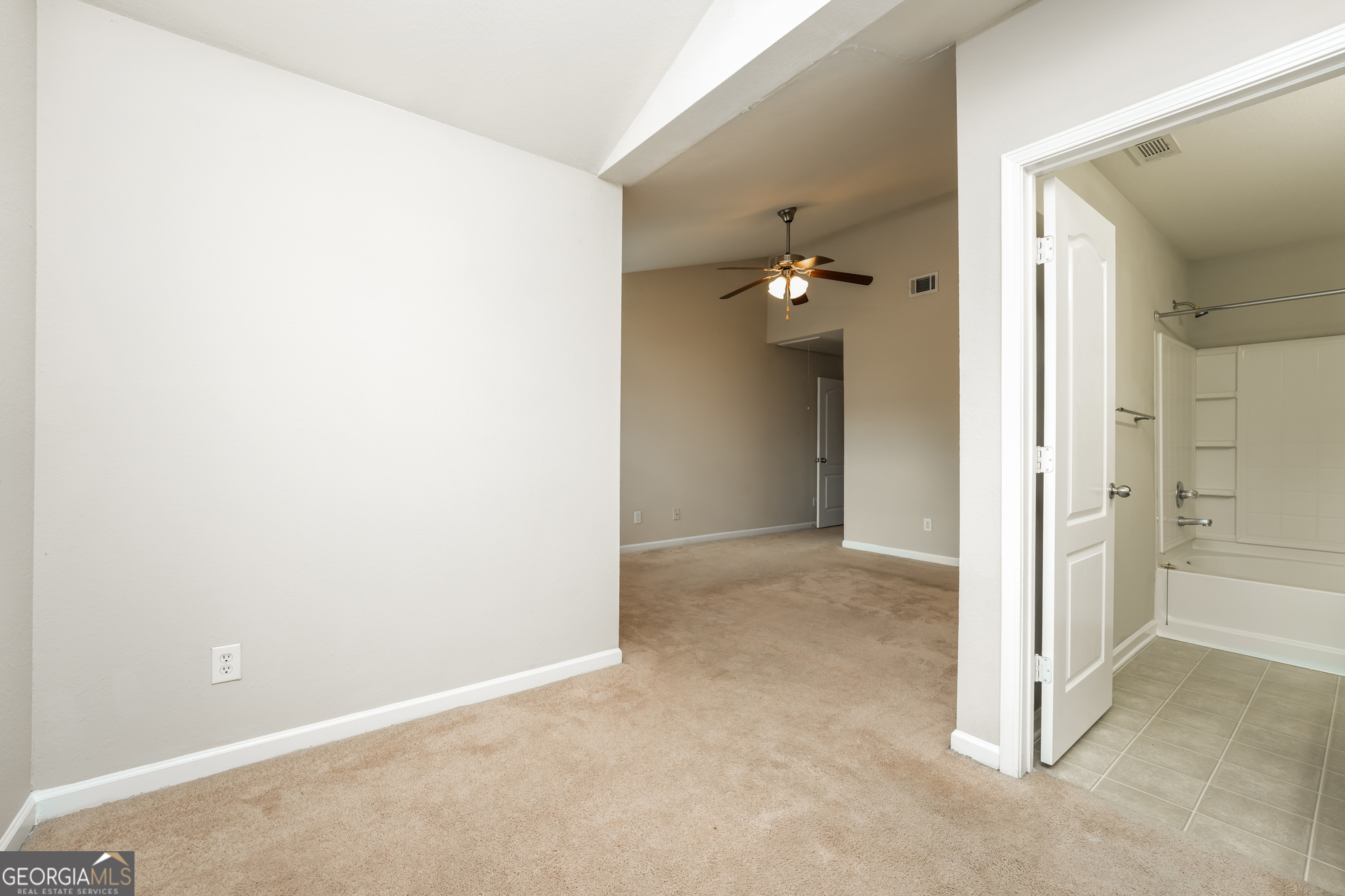 1259 Chinon Point Lithonia, GA 30058 - Photo 7 of 15 an empty room with a bathroom