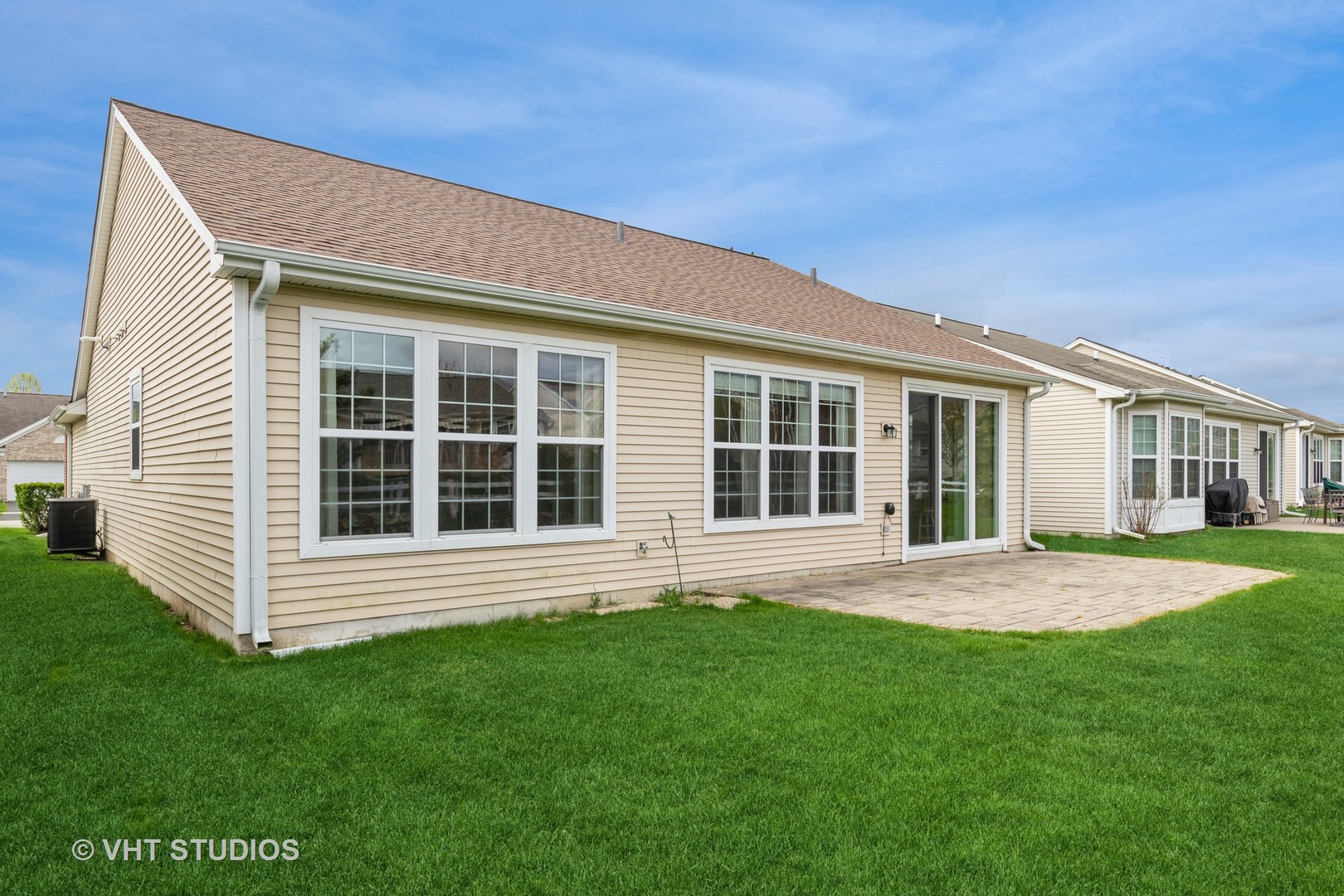 2836 Edgewater Drive Elgin, IL 60124 - Photo 20 of 35 a front view of a house with a garden