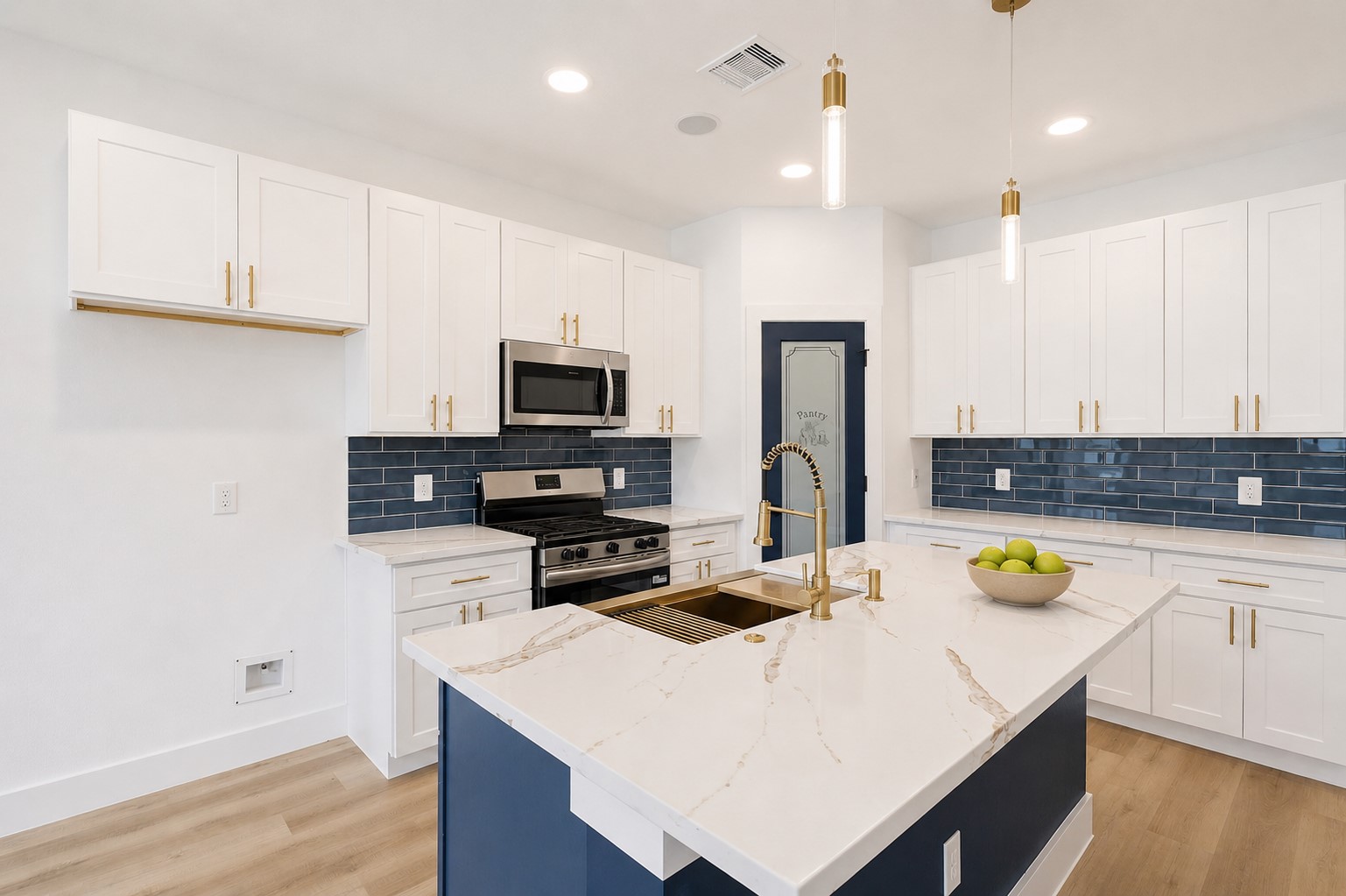 4606 Mallow Street, Unit B Houston, TX 77051 - Photo 8 of 25 a kitchen with a sink a stove cabinets and wooden floor