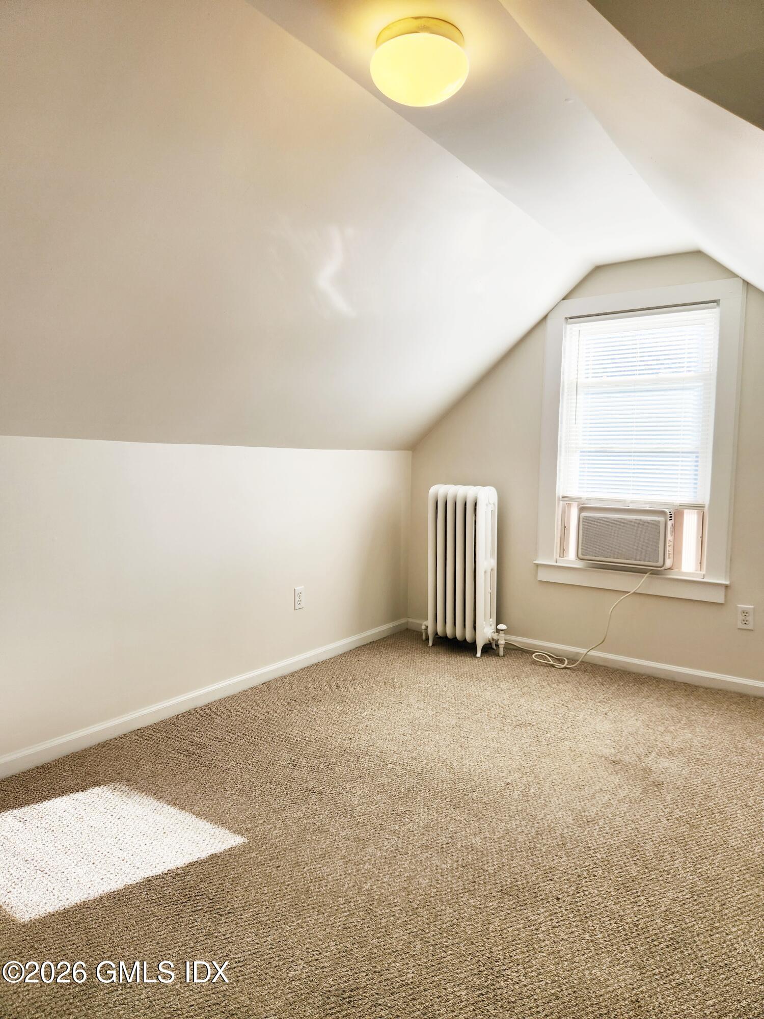 79 Valley Road Cos Cob, CT 06807 - Photo 13 of 20 a view of an empty room and window