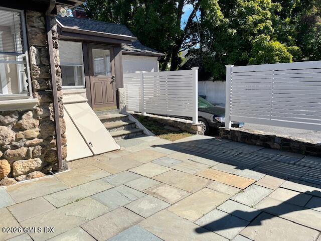 79 Valley Road Cos Cob, CT 06807 - Photo 20 of 20 a backyard of a house with lots of green space