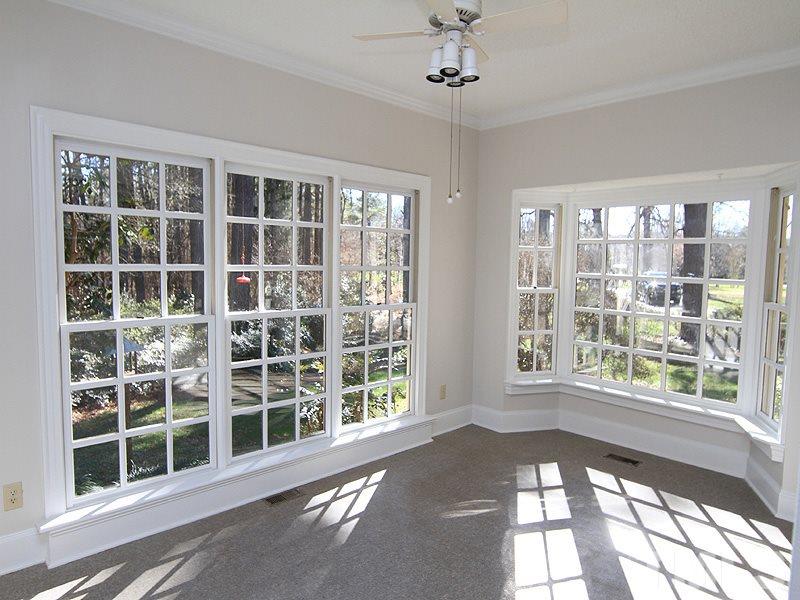 268 Log Barn Road Pittsboro, NC 27312 - Photo 13 of 25 Tall Floor-to-Ceiling Windows in Breakfast Room "Brings the outside In"