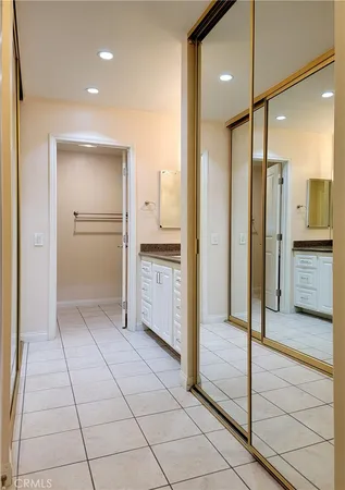 a bathroom with a shower and a sink