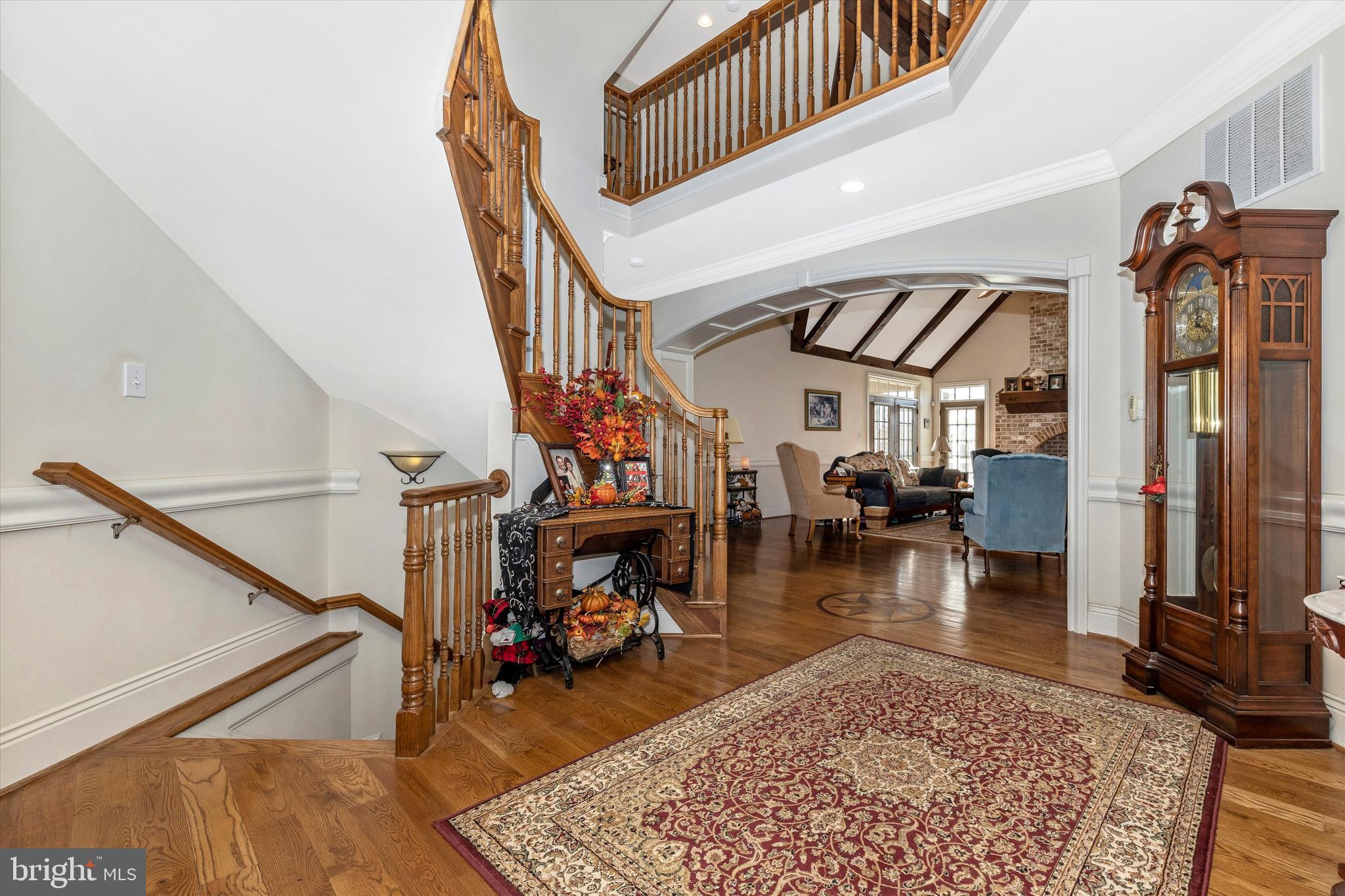 9455 Longs Mill Road Rocky Ridge, MD 21778 - Photo 13 of 70 Foyer view into family room with arched entryway