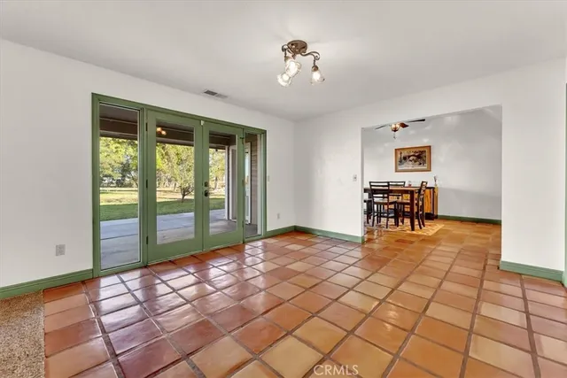a kitchen with stainless steel appliances granite countertop a stove and a microwave
